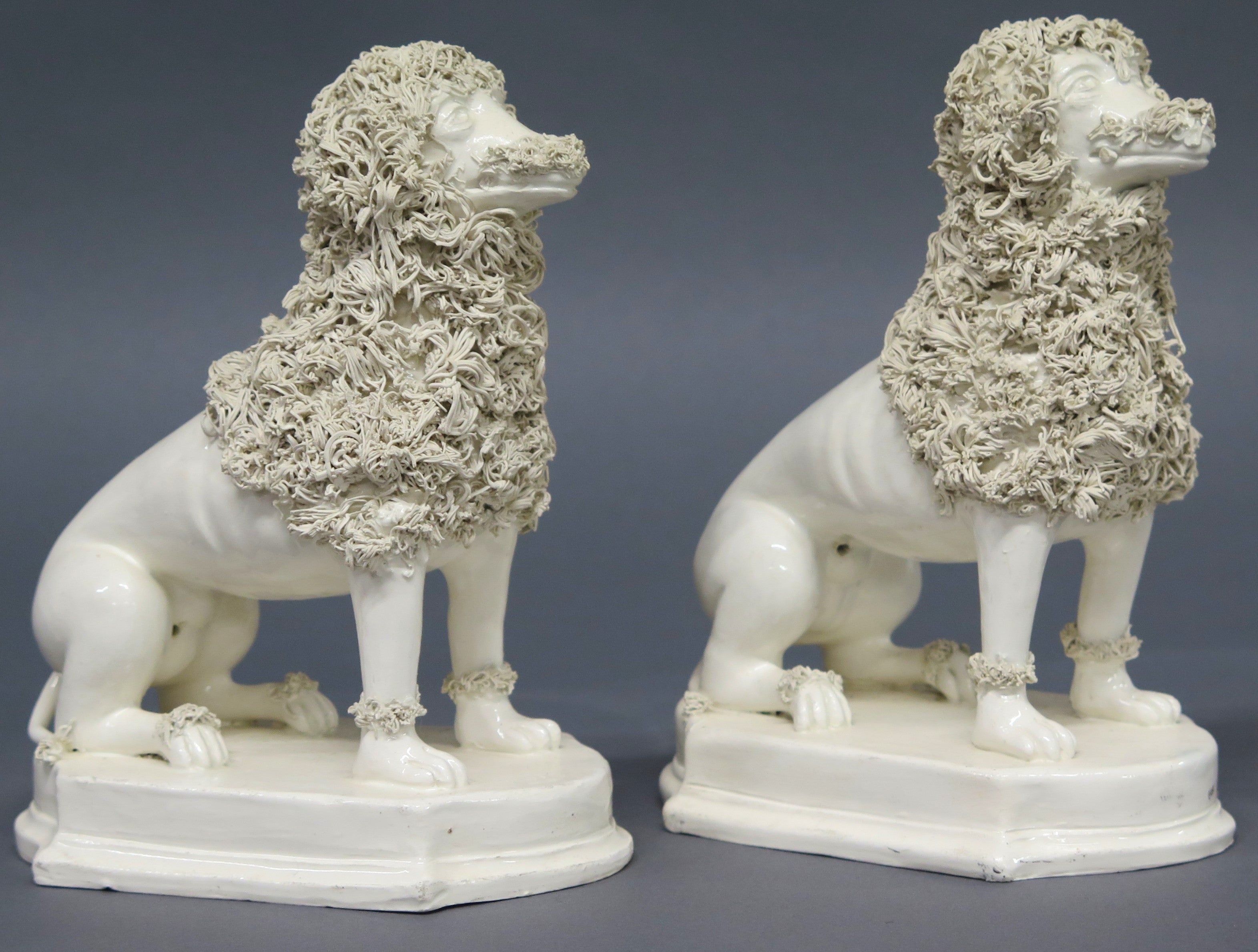 A Pair of Early 19th Century Creamware Dogs