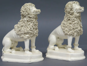 A Pair of Early 19th Century Creamware Dogs