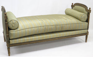 A Nicely Carved Louis XVI Paint and Parcel Gilt Daybed