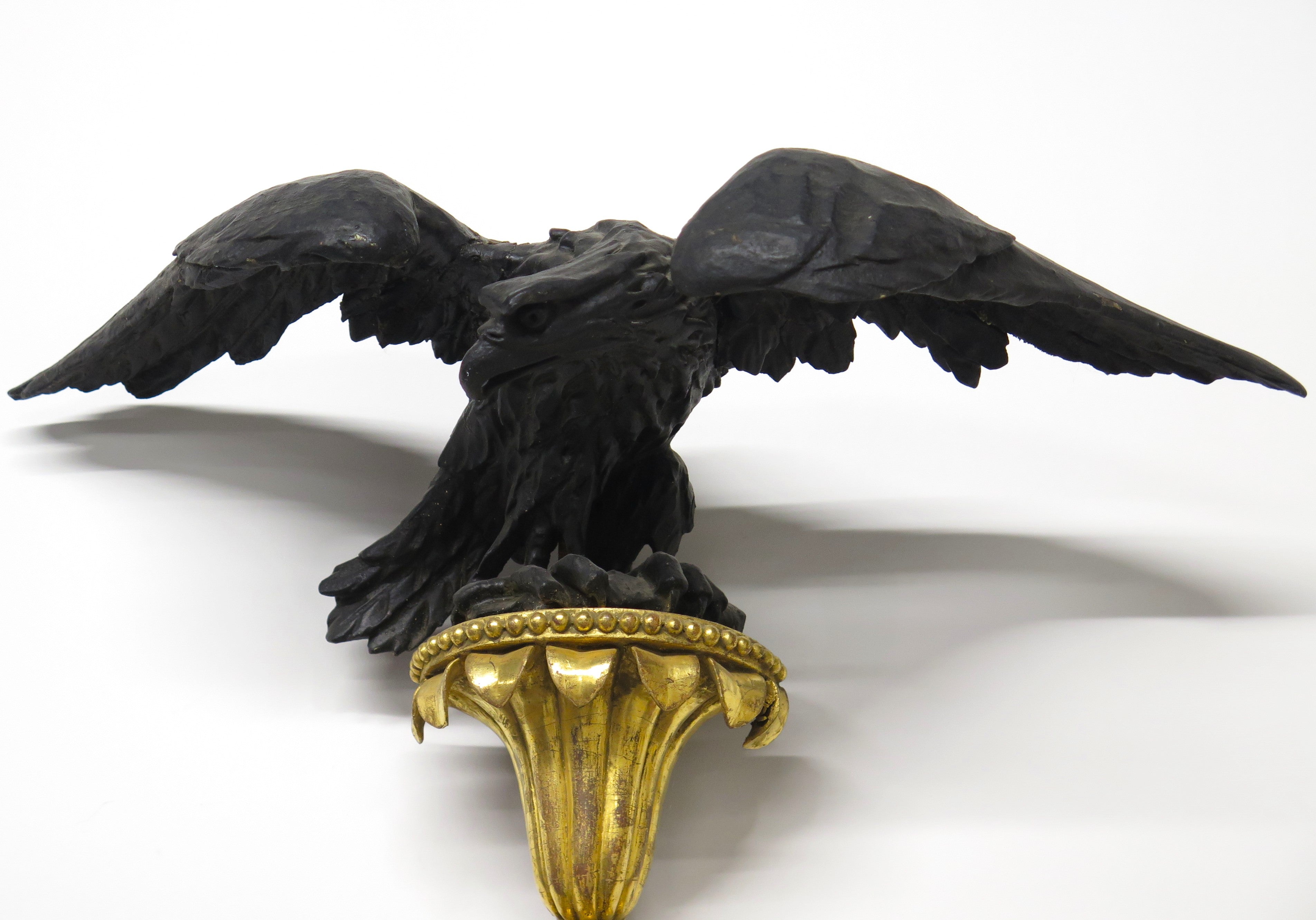 A Superb Early Regency Ebonised and Giltwood Convex Mirror