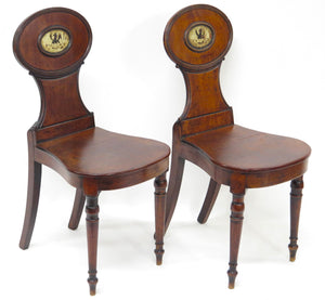A Pair of English Regency Mahogany Hall Chairs