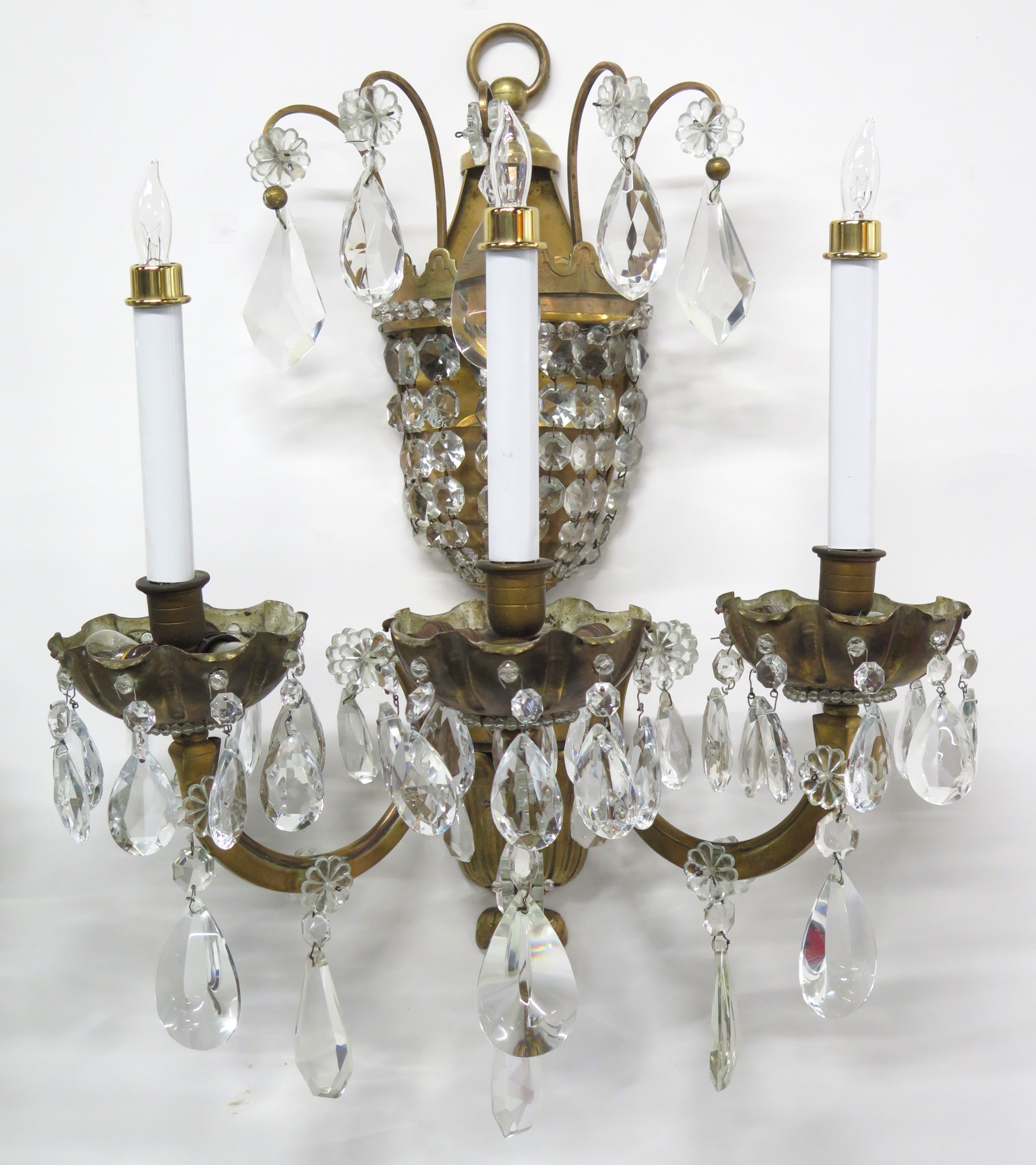 A Pair of Maison Jansen Three Light Bronze and Crystal Sconces