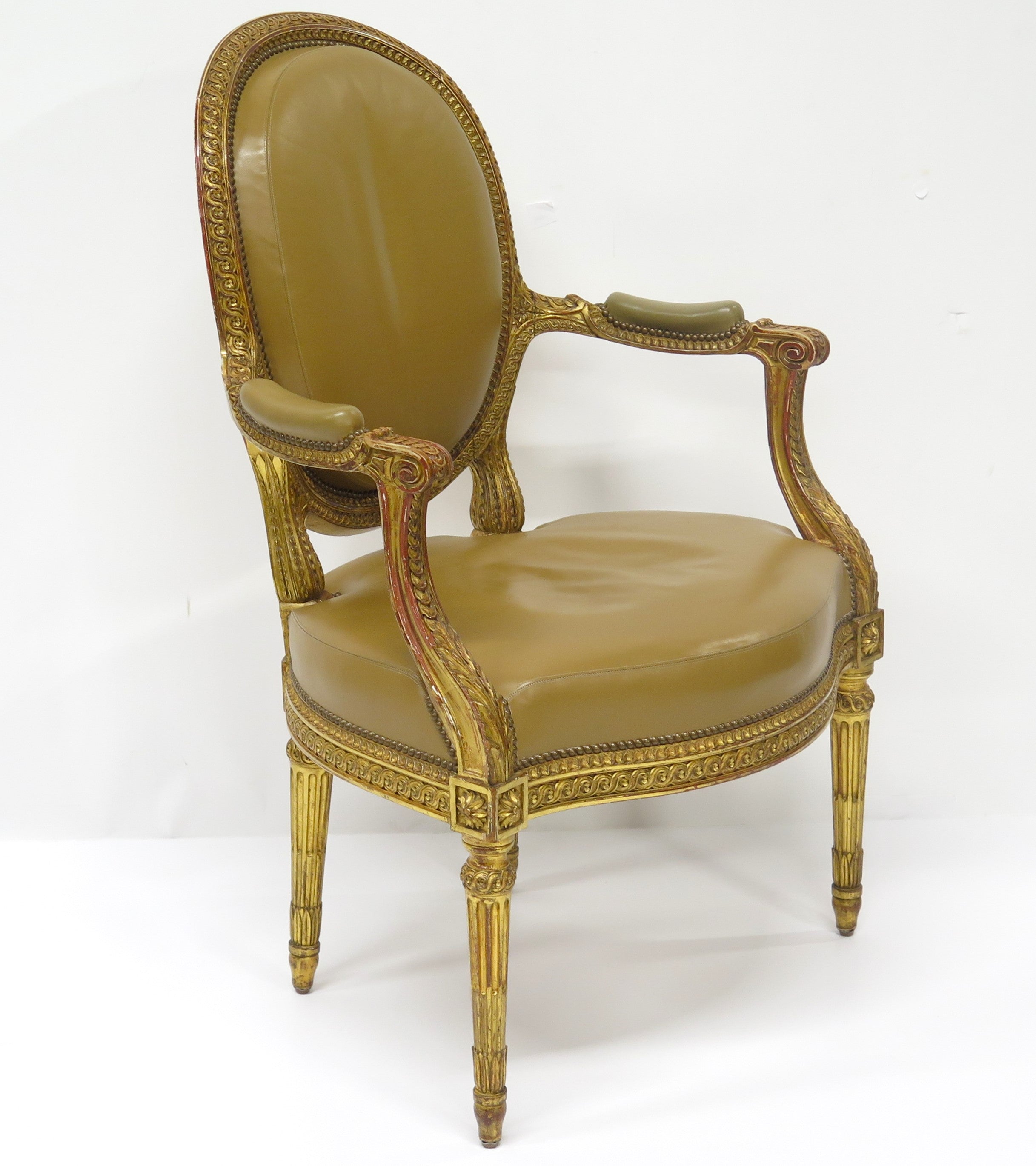 Louis XVI-Style Carved and Gilded Leather Fauteuil