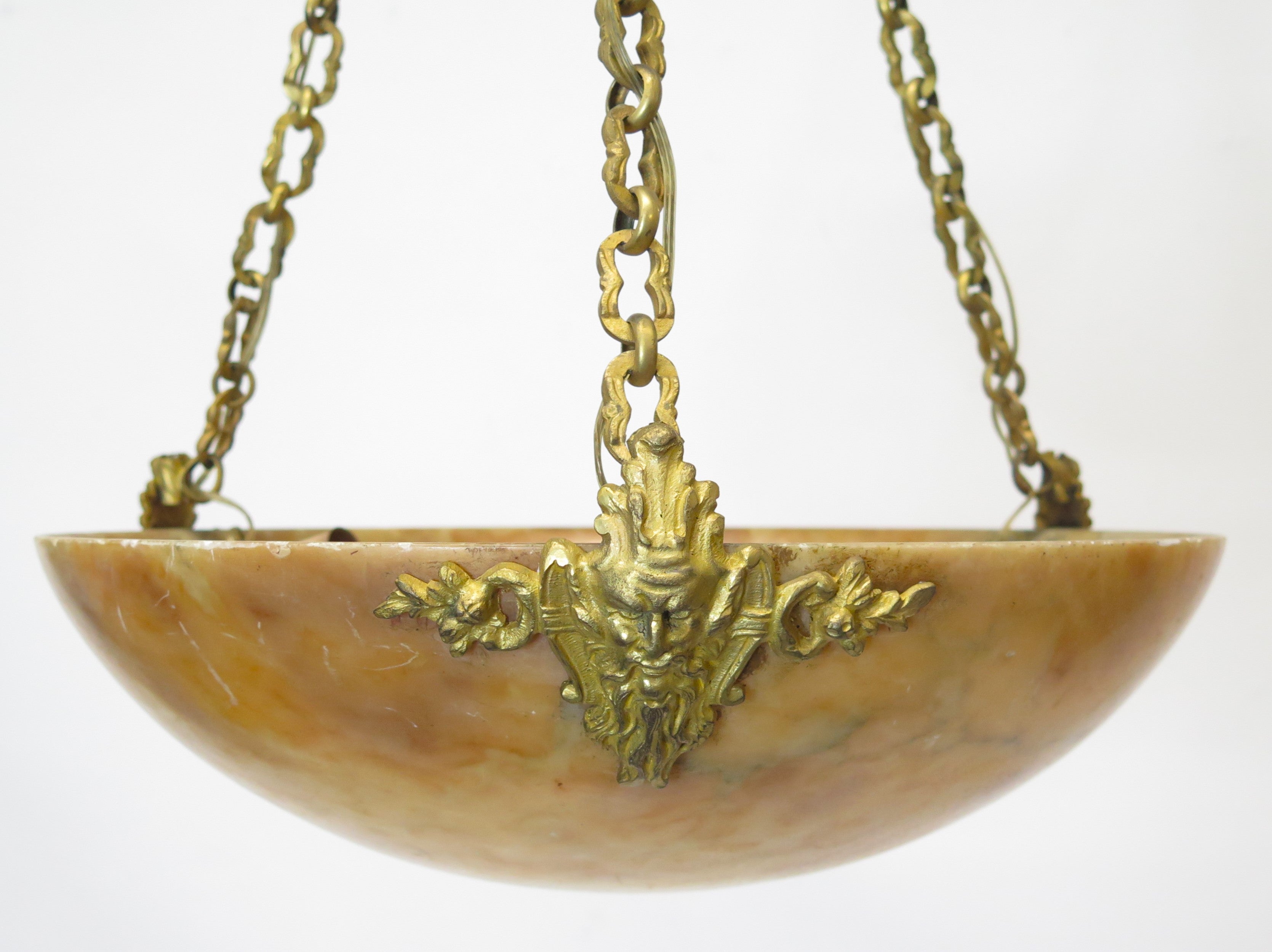 A French Art Deco alabaster and gilt bronze chandelier