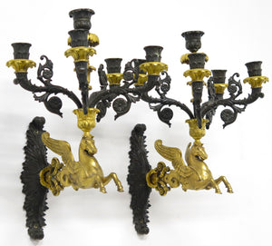A Pair of Charles X Pattinated and Gilt Five Arm Wall Lights