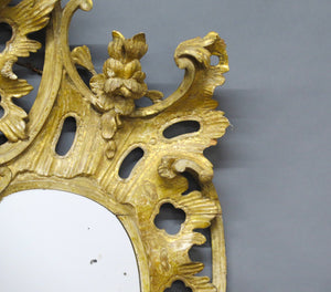 Early George III Rococo, Likely Irish, Elaborately Carved Giltwood Looking Glass / Mirror