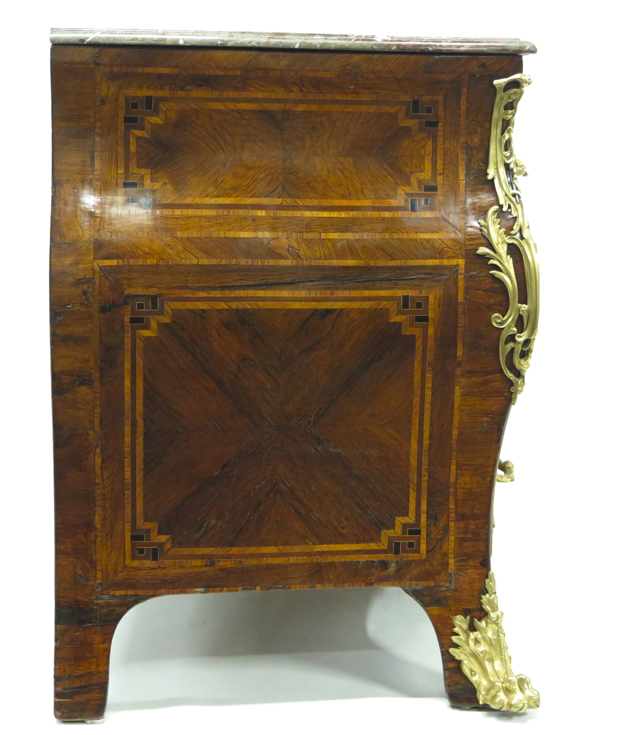 A Louis XV Chest in Violet Wood/Purpleheart Veneer, Crossbanded in