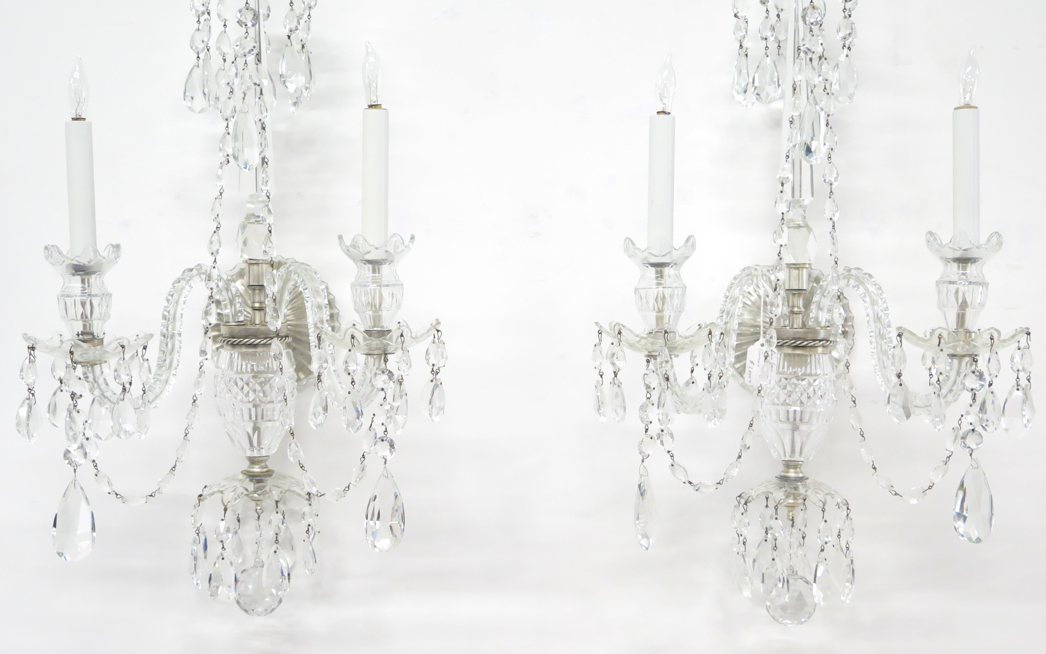 A Large Scale Pair of Georgian Design Two Light Crystal Sconces
