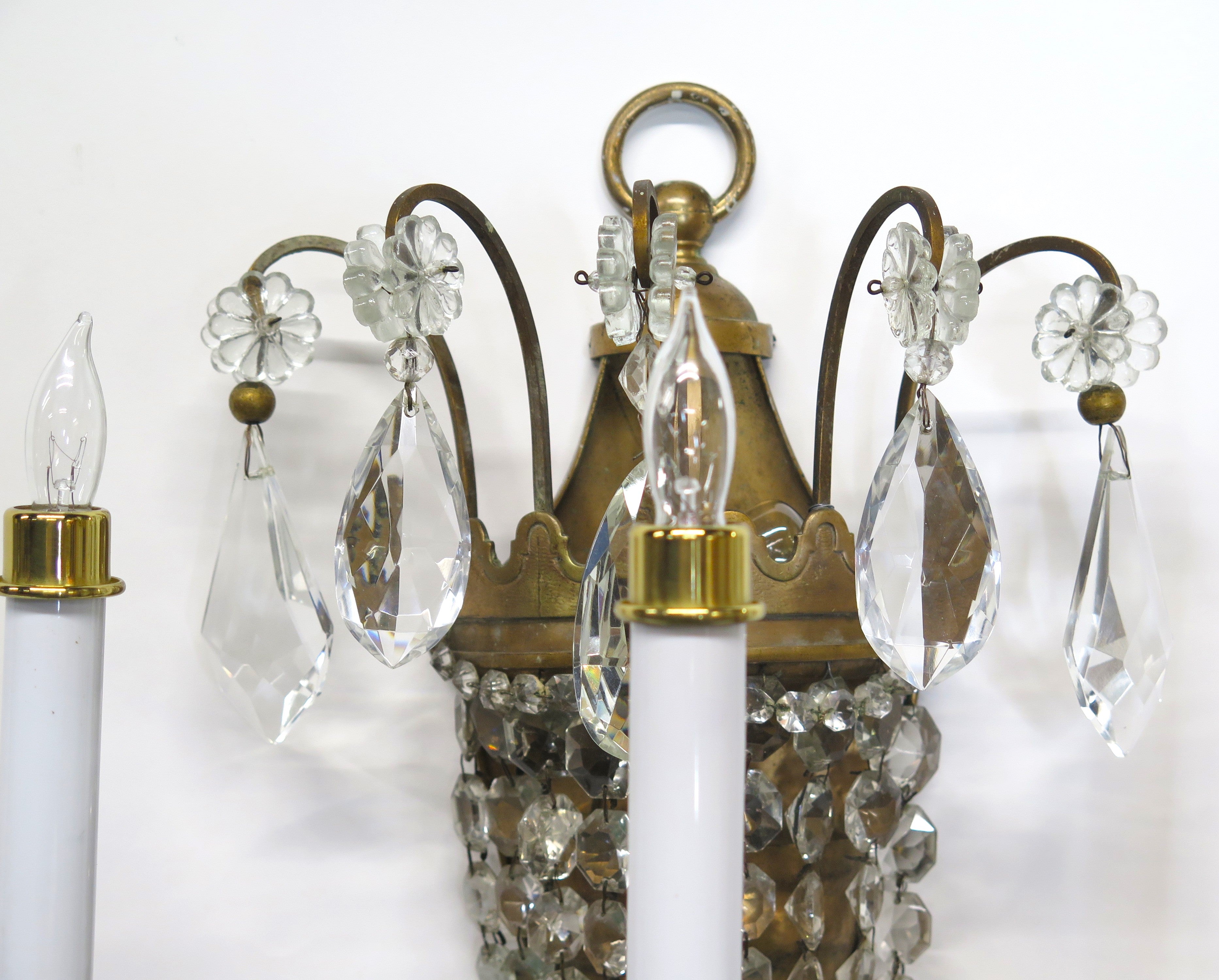 A Pair of Maison Jansen Three Light Bronze and Crystal Sconces