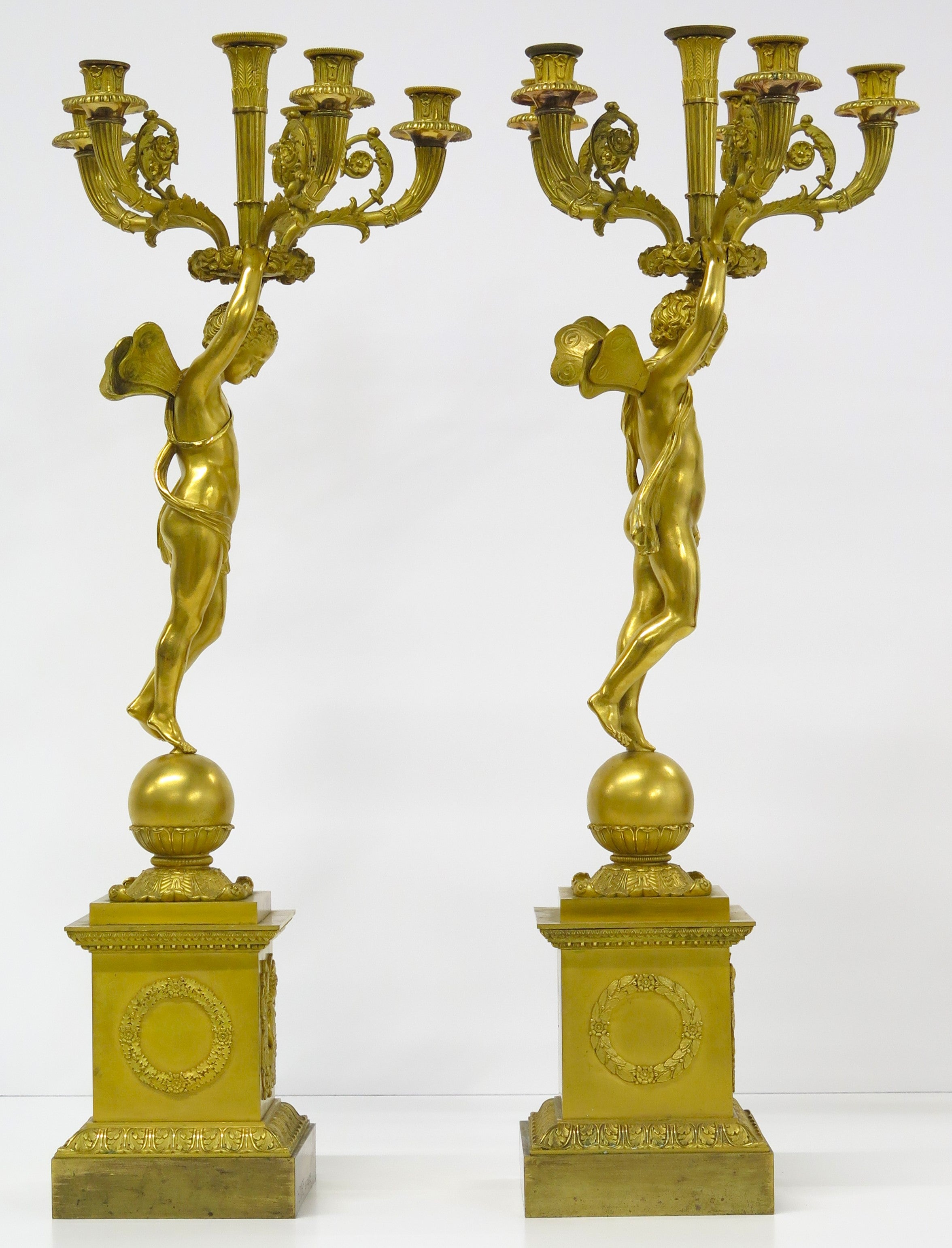 A Pair of French Empire Six Light Figural Candelabra