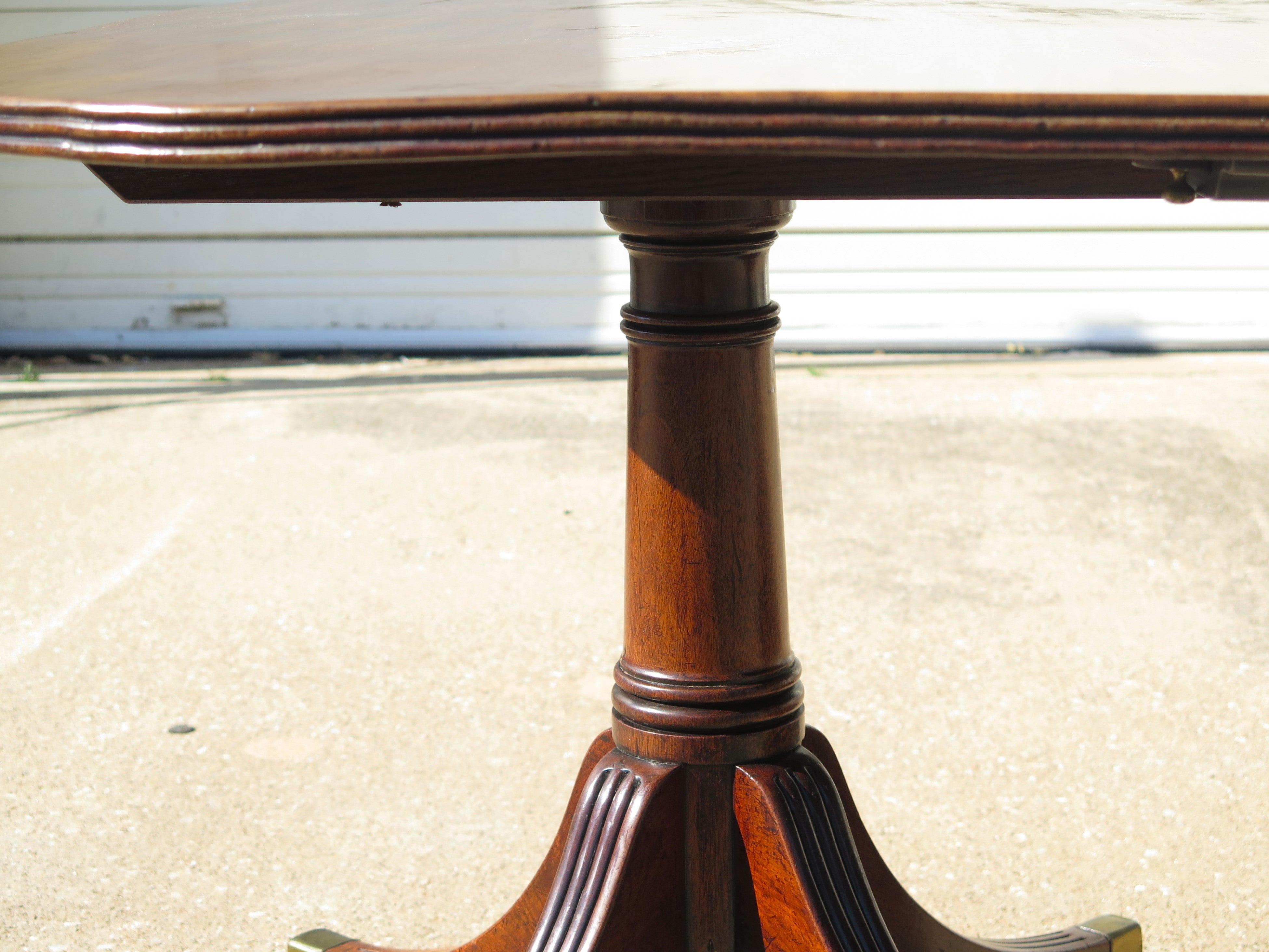 A Fine George III Three Pedestal Dining Table