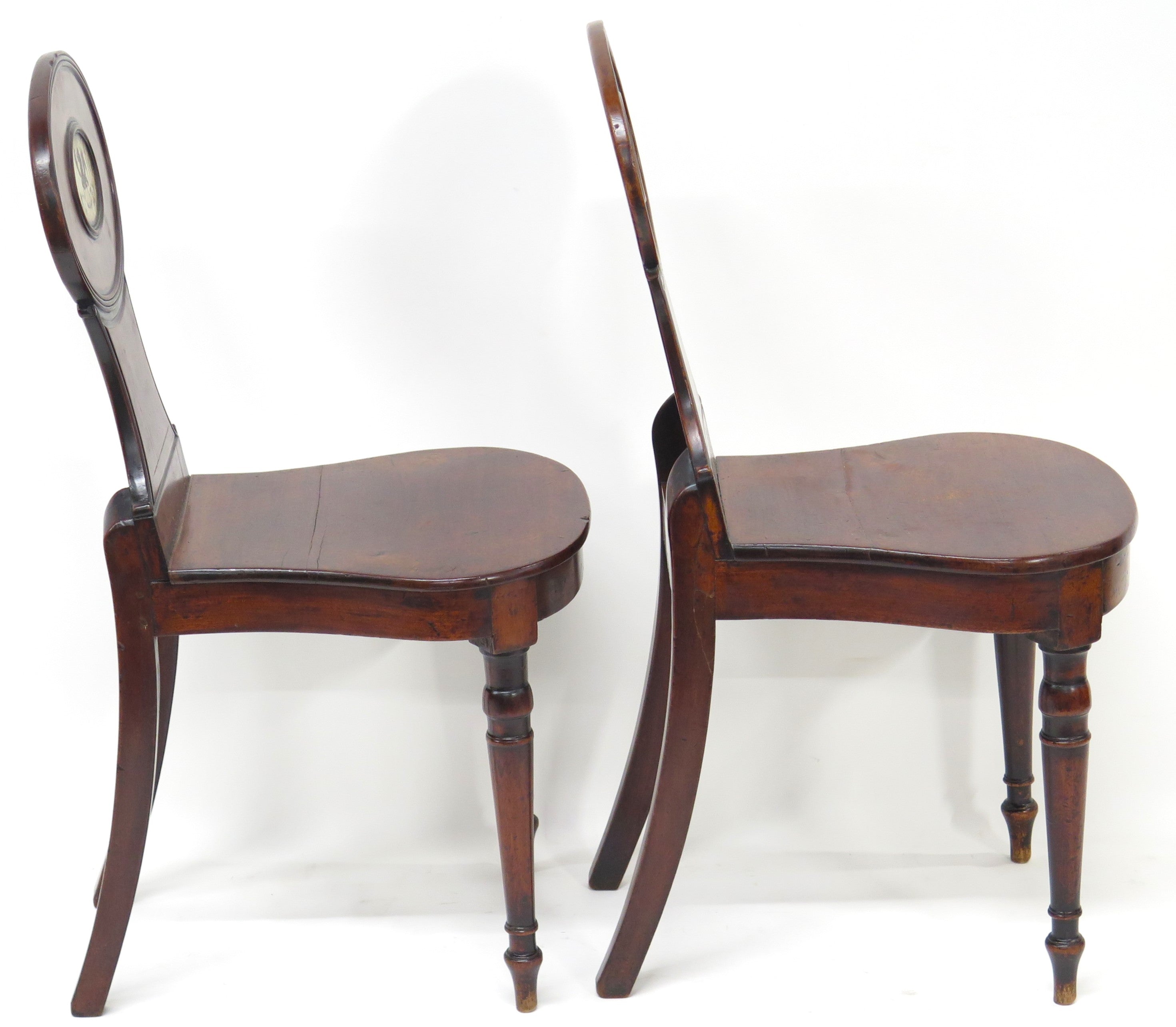 A Pair of English Regency Mahogany Hall Chairs