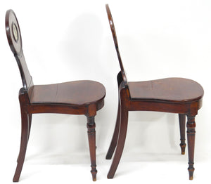 A Pair of English Regency Mahogany Hall Chairs