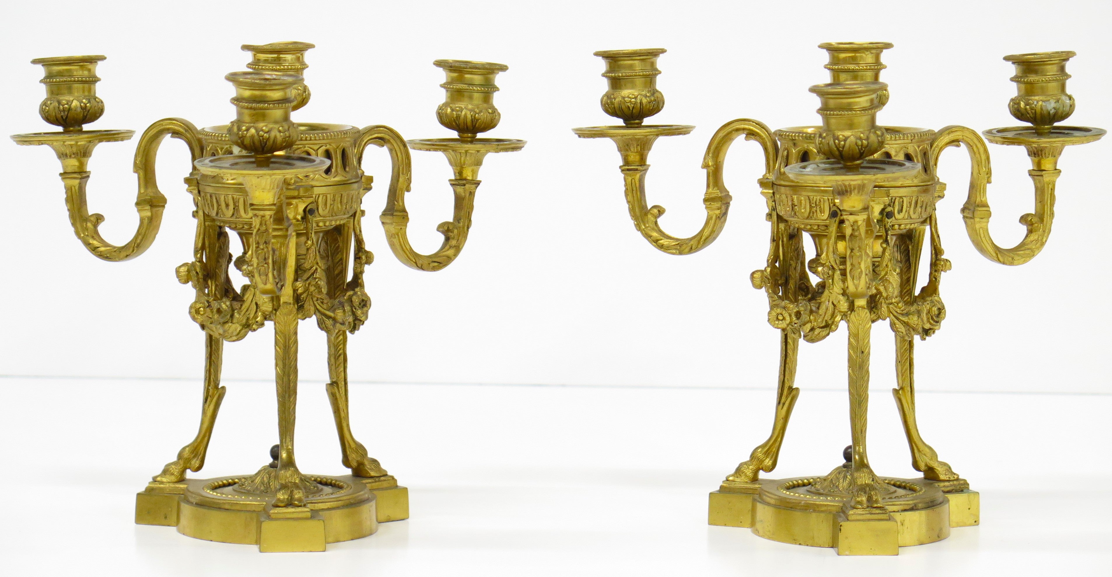 A Pair of Finely Cast and Chased Louis XVI Ormalu Four-Light Cassolette