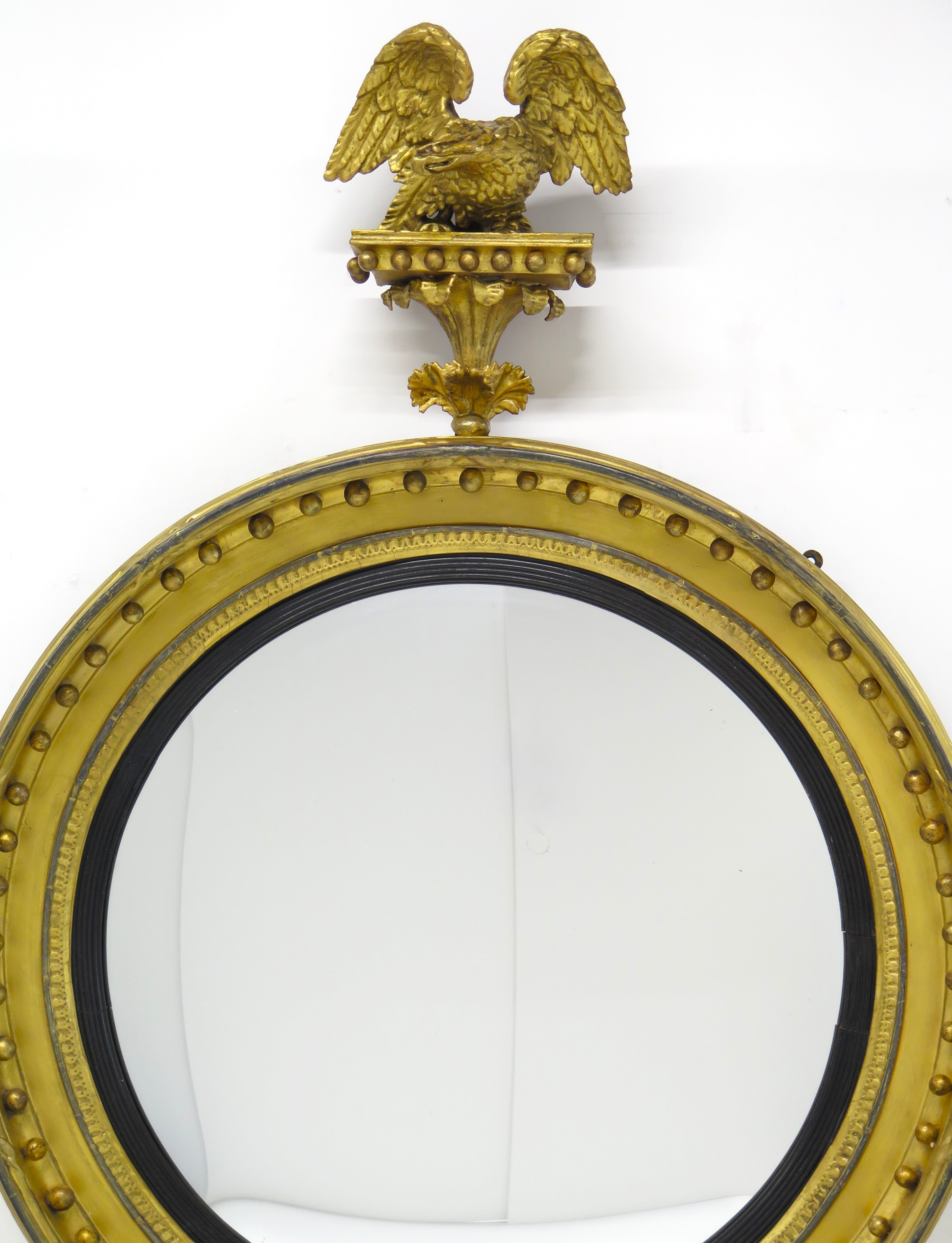 A Large English Regency Gilt Wood Convex Mirror