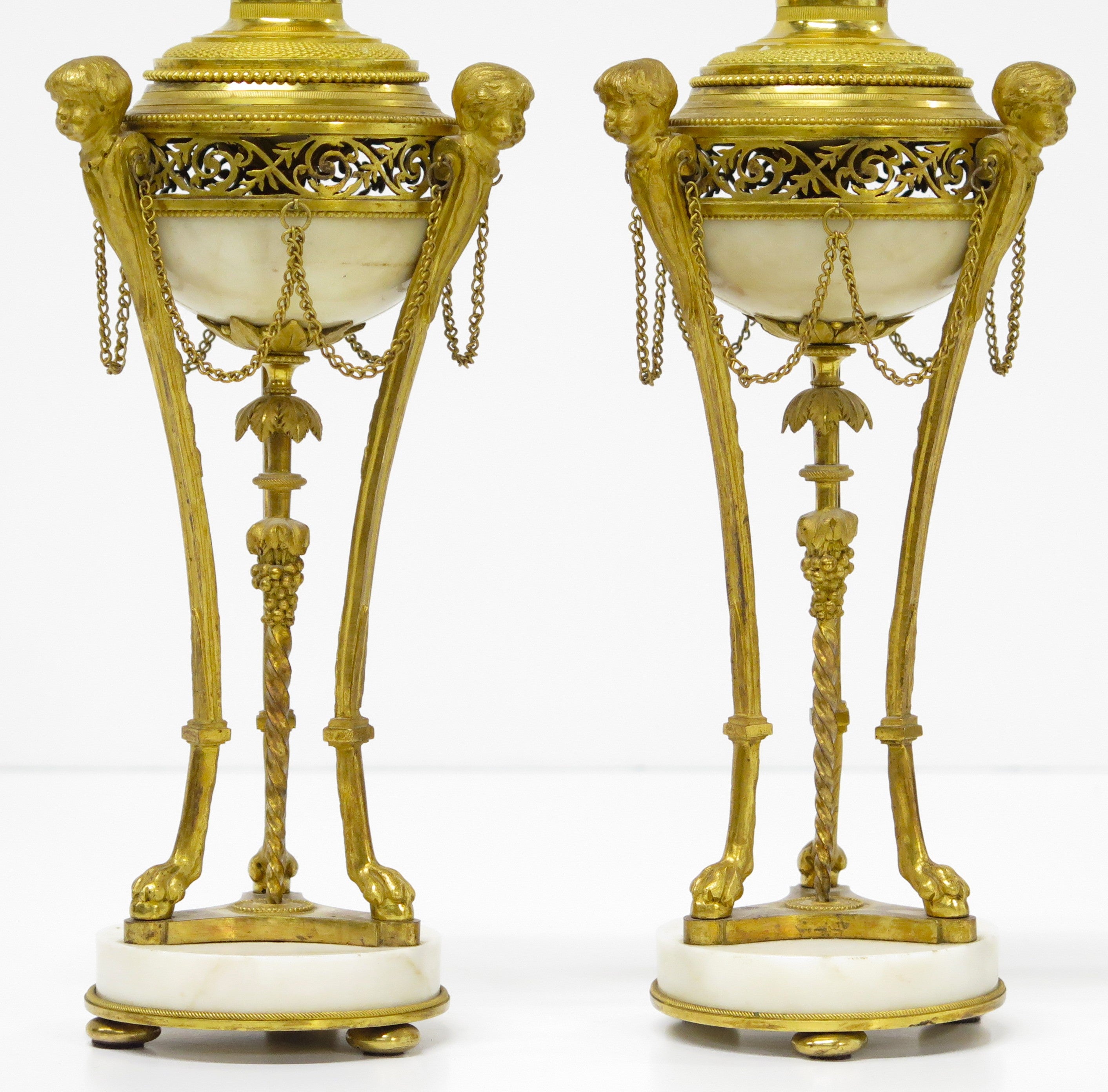 A Pair of Louis XVI Ormolu and White Marble Cassolettes