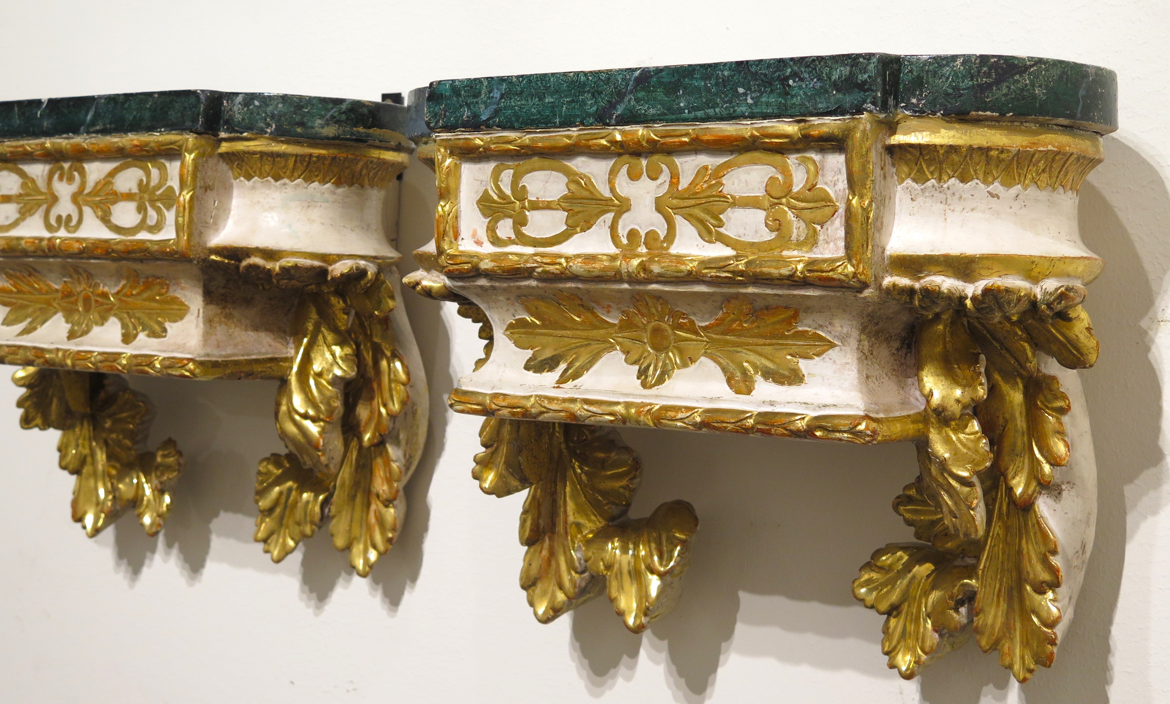 Pair of Carved Painted and Parcel Gilt Wall Brackets