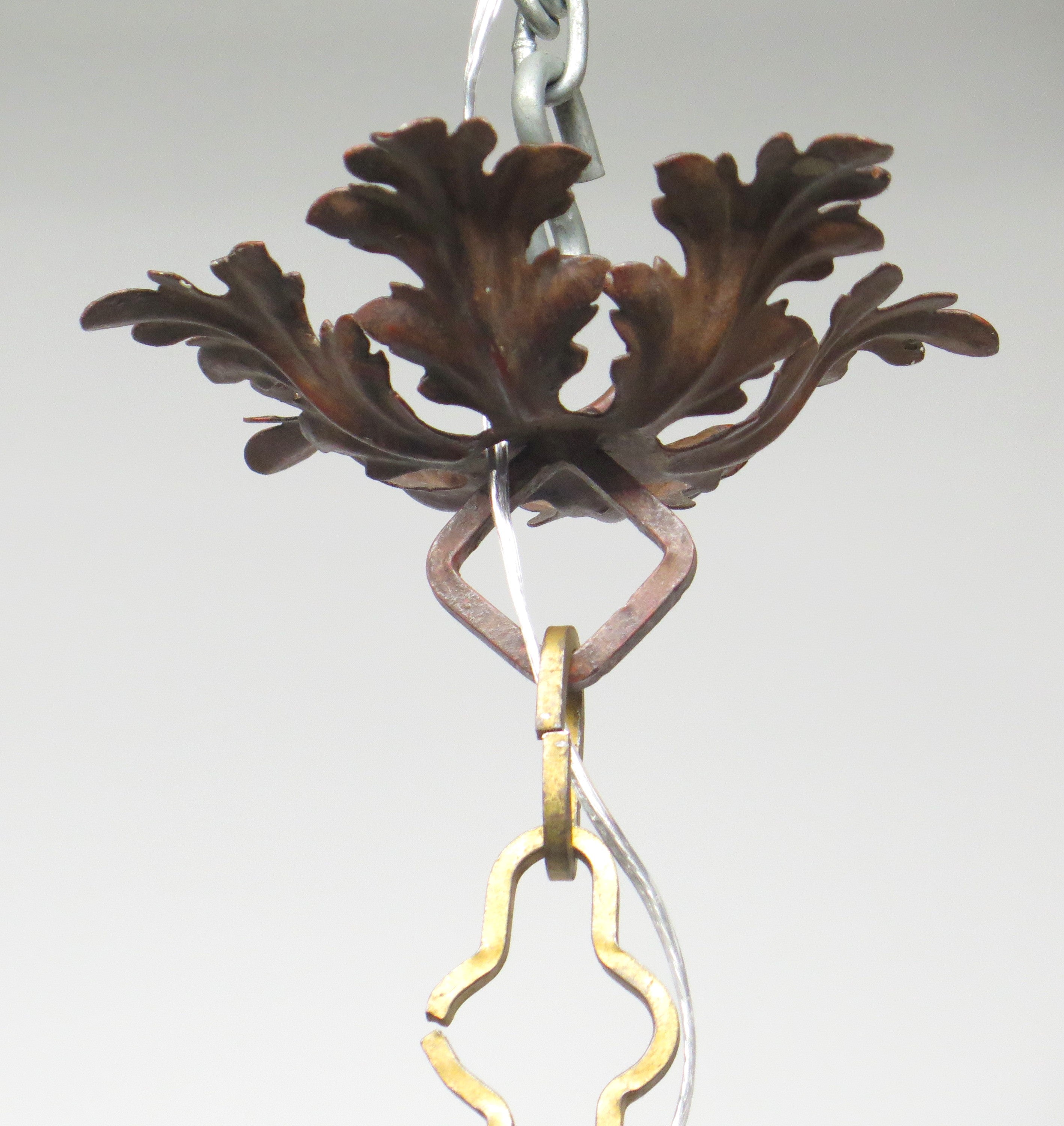 A Carved Italian Faux Bois Pickled Ten Light Chandelier