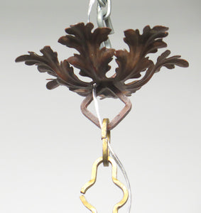 A Carved Italian Faux Bois Pickled Ten Light Chandelier