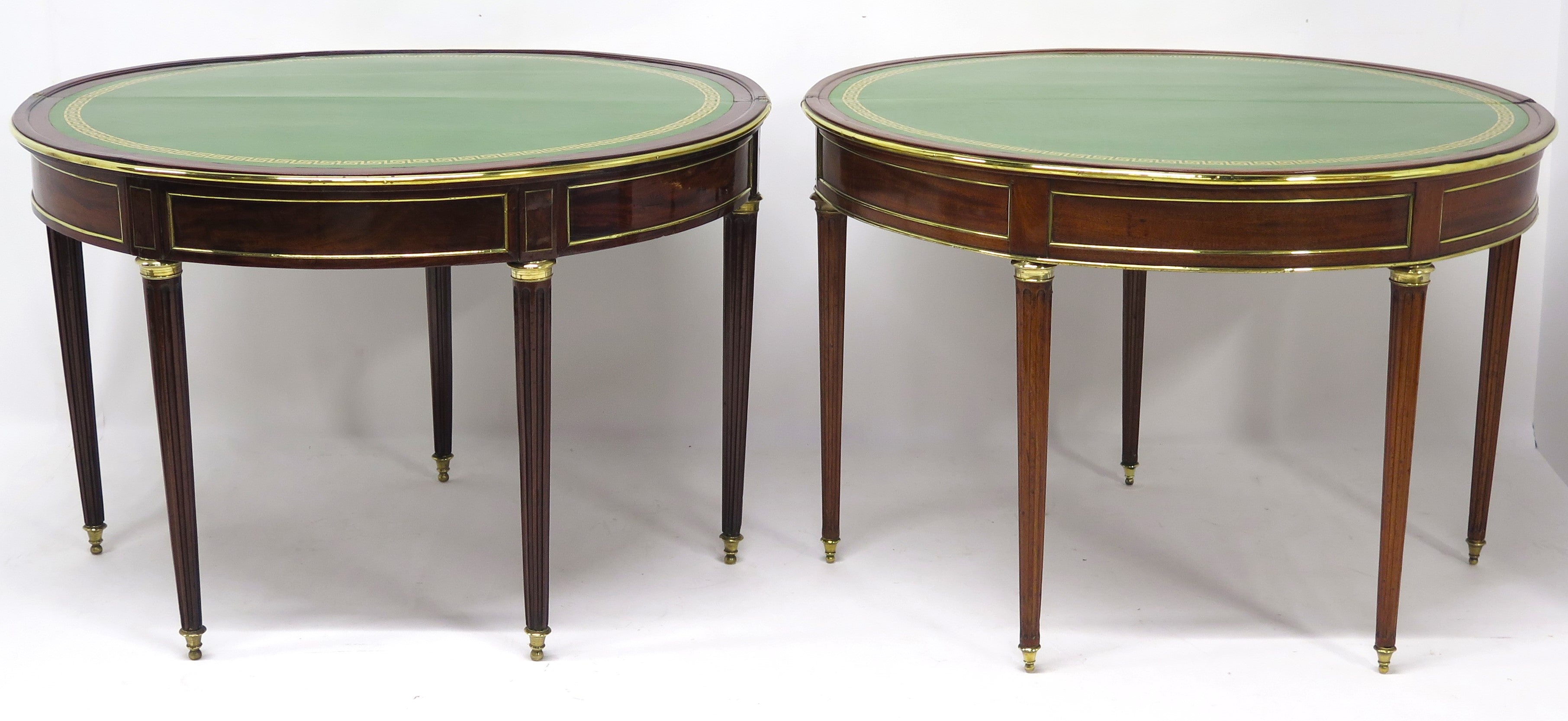 A Beatiful "Near" Pair of Louis XVI Style Mahogany and Brass Mounted Demilune Games Tables
