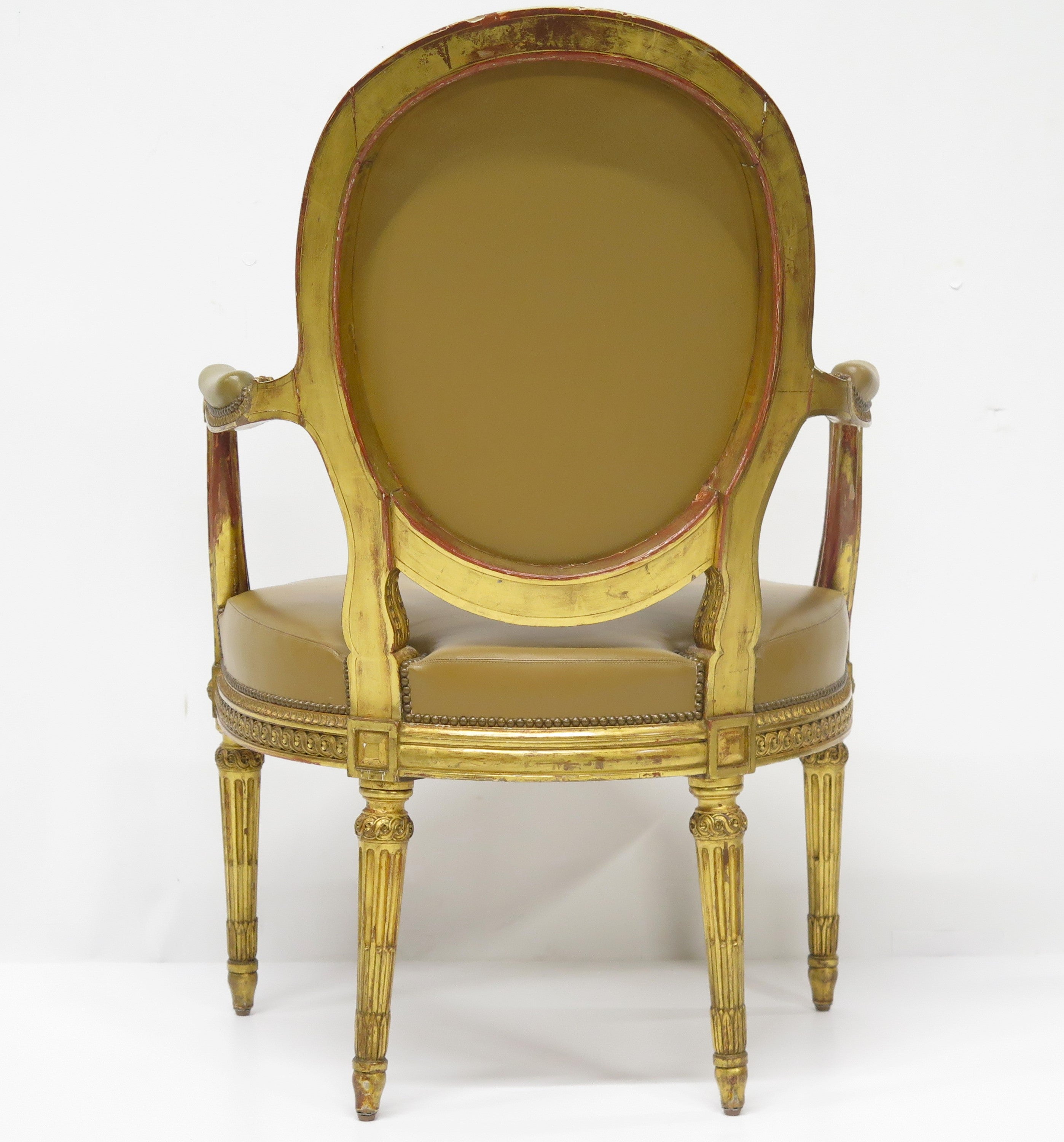 Louis XVI-Style Carved and Gilded Leather Fauteuil