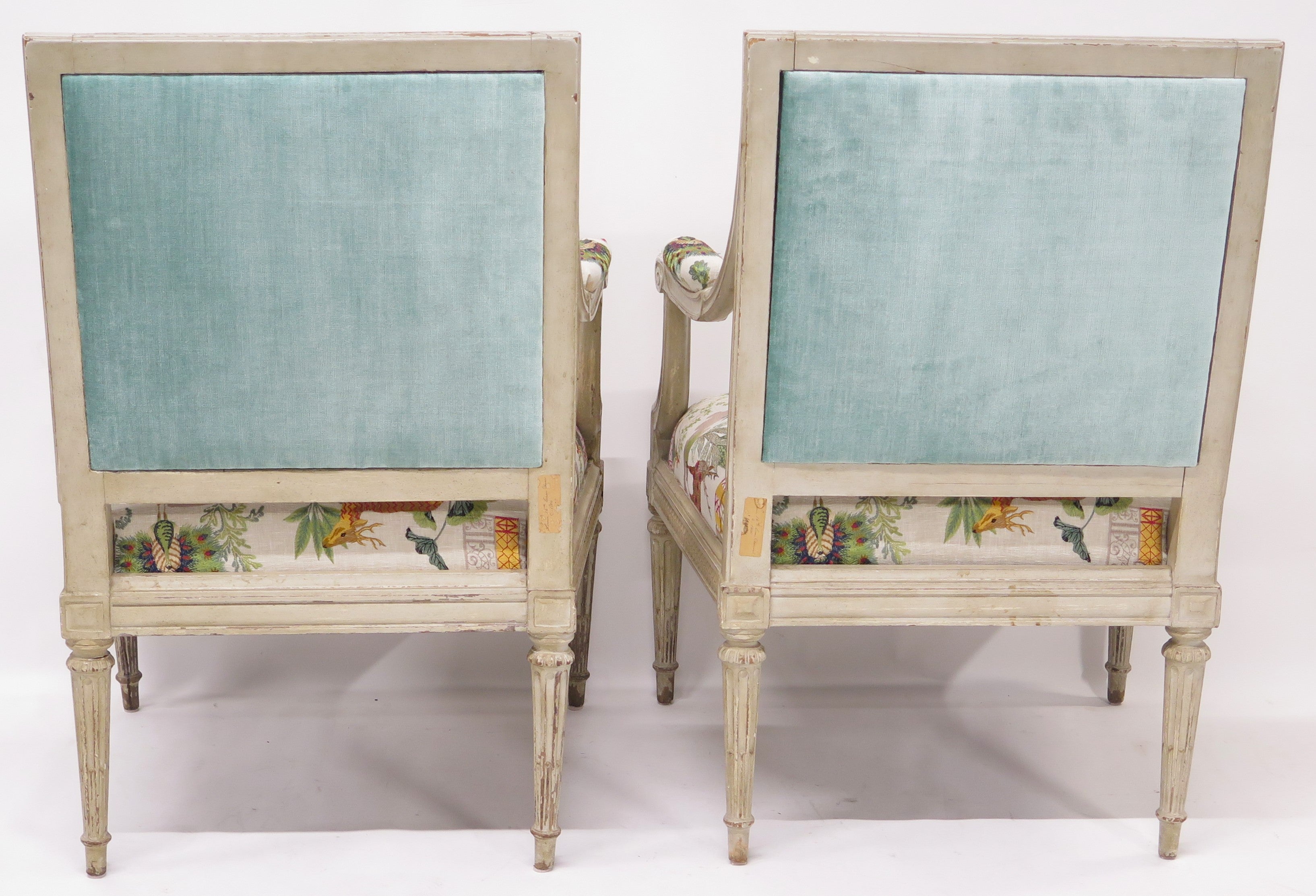 A Pair of Louis XVI Style Cream Colored Nicely Carved Fauteuils