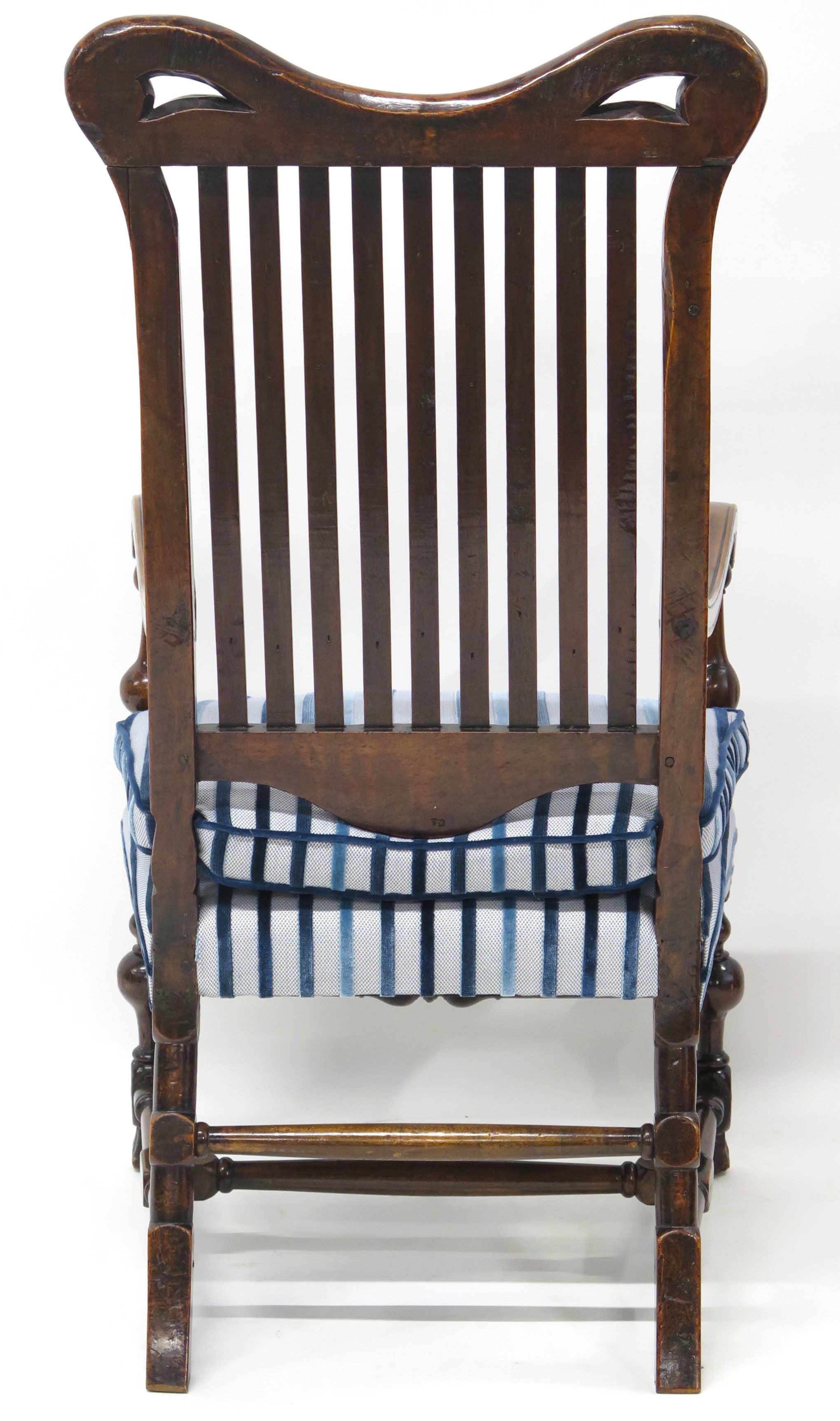 A Rare Form William and Mary Walnut Banister Back Armchair