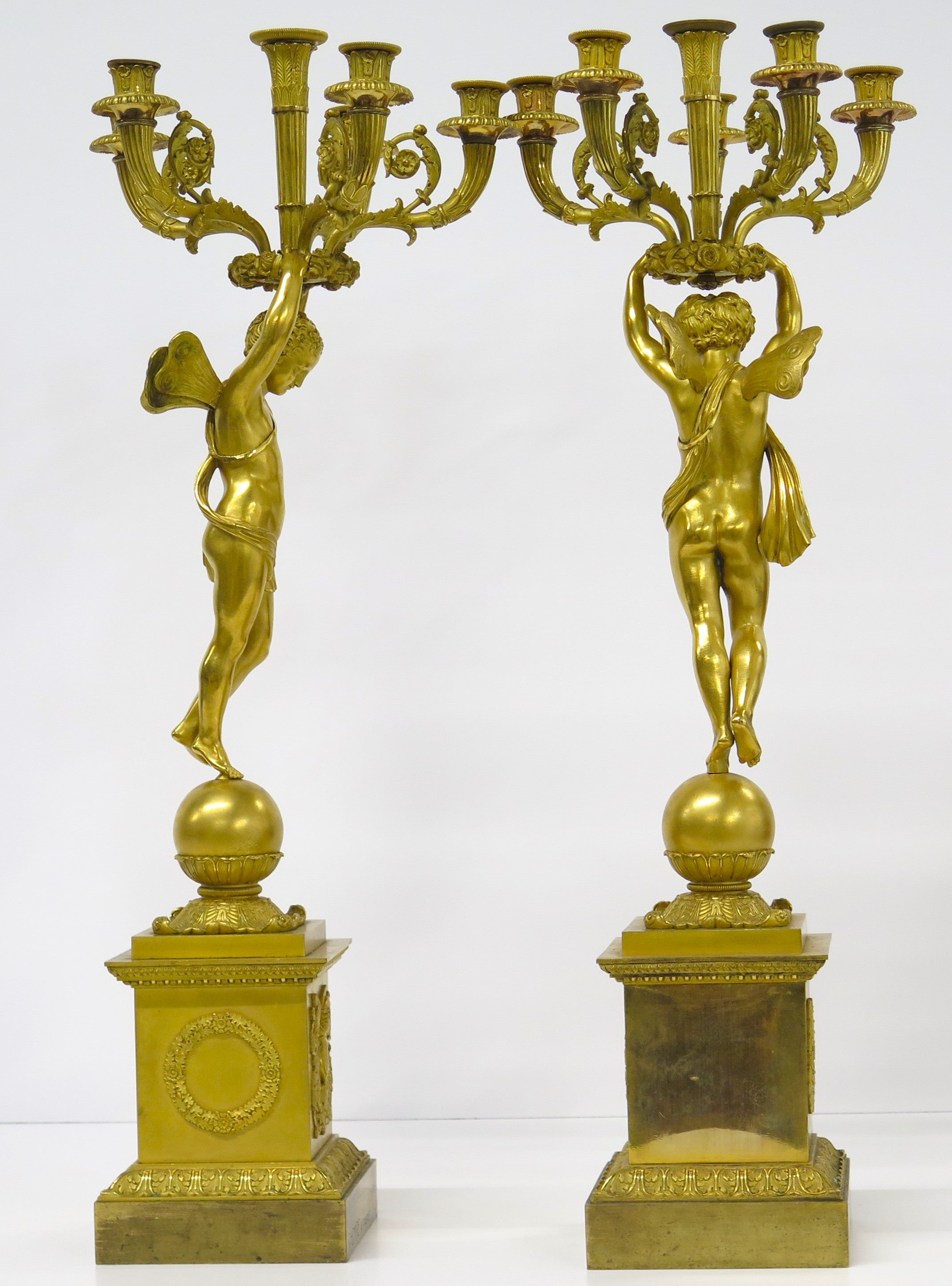 A Pair of French Empire Six Light Figural Candelabra