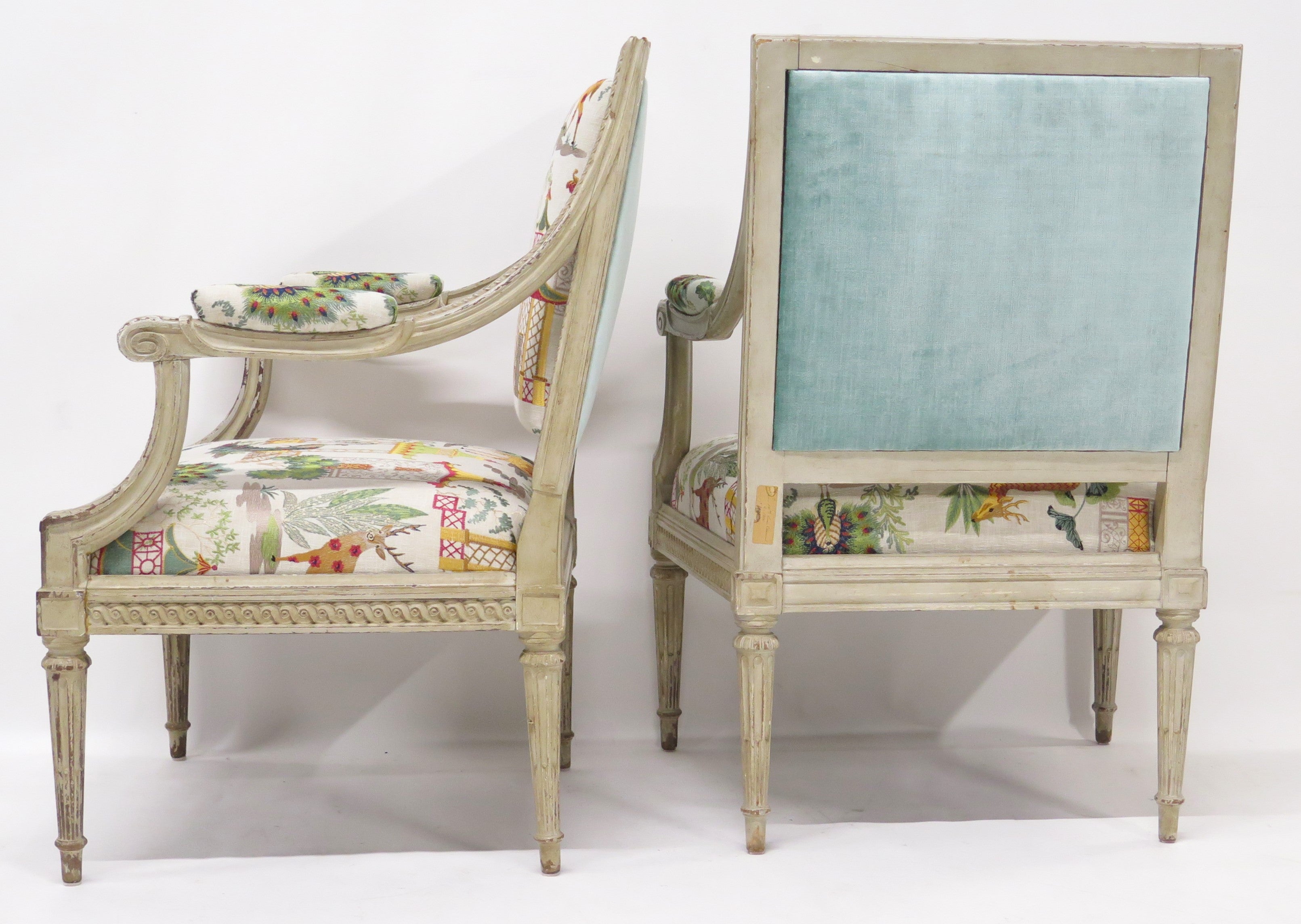 A Pair of Louis XVI Style Cream Colored Nicely Carved Fauteuils