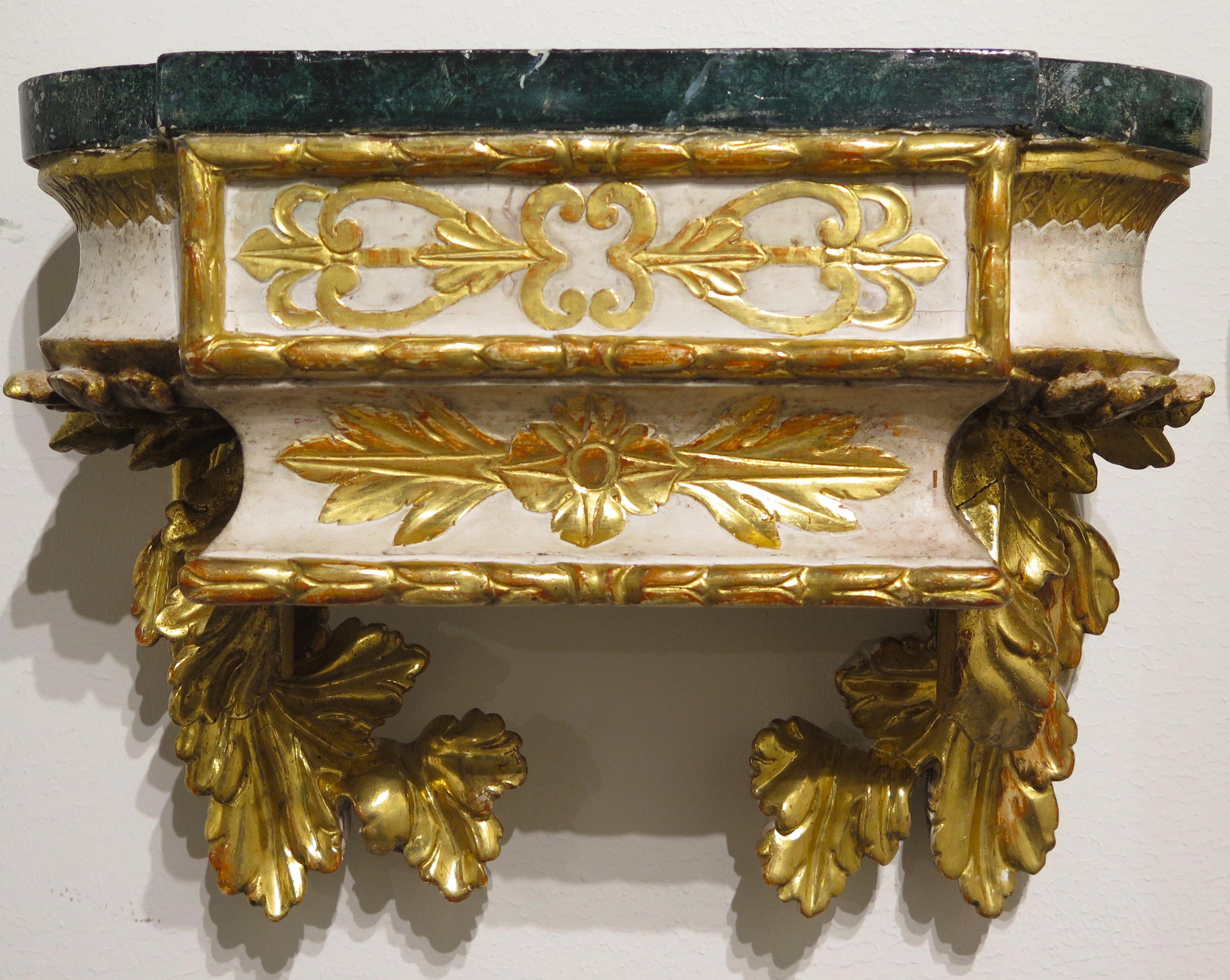 Pair of Carved Painted and Parcel Gilt Wall Brackets
