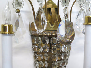 A Pair of Maison Jansen Three Light Bronze and Crystal Sconces