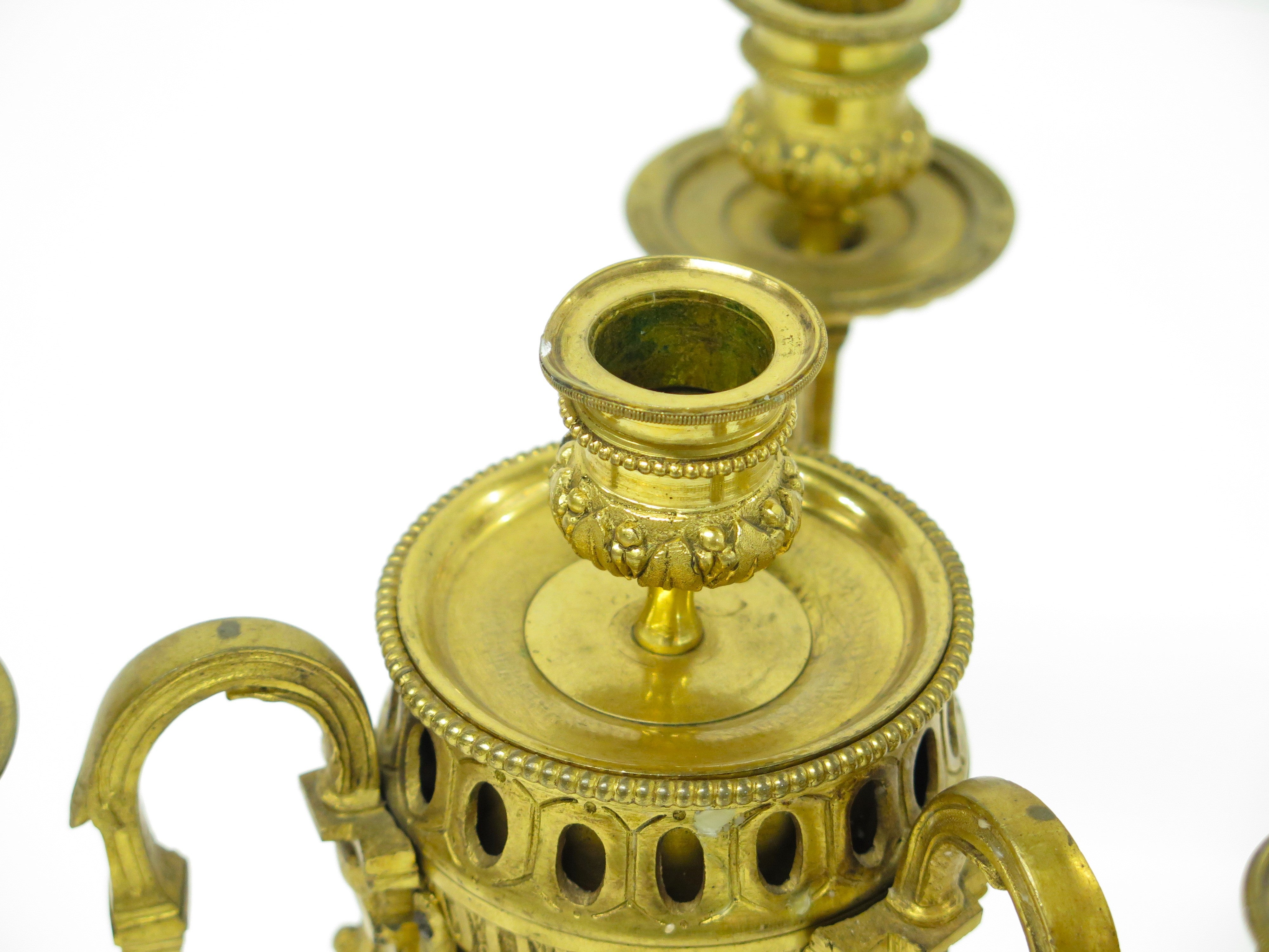 A Pair of Finely Cast and Chased Louis XVI Ormalu Four-Light Cassolette