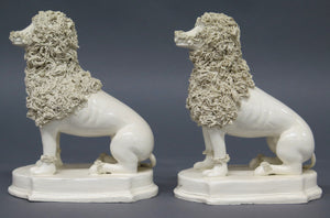 A Pair of Early 19th Century Creamware Dogs