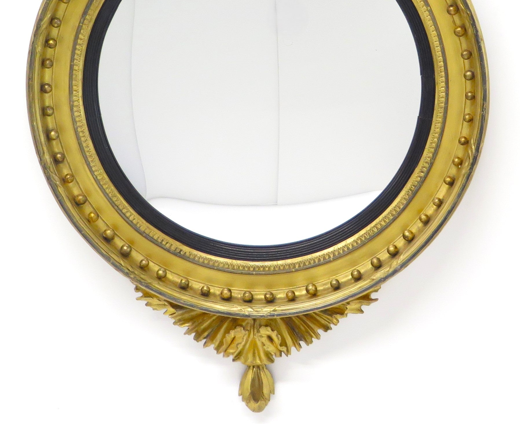 A Large English Regency Gilt Wood Convex Mirror