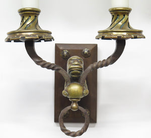 A Pair of Early 20th C. Hand Wrought Iron Two Light Sconces