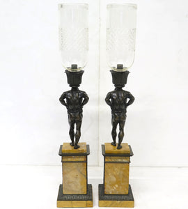 Pair of French Restoration Period Candlesticks of Patinated Bronze and Gilt Bronze with Figures of Atlas