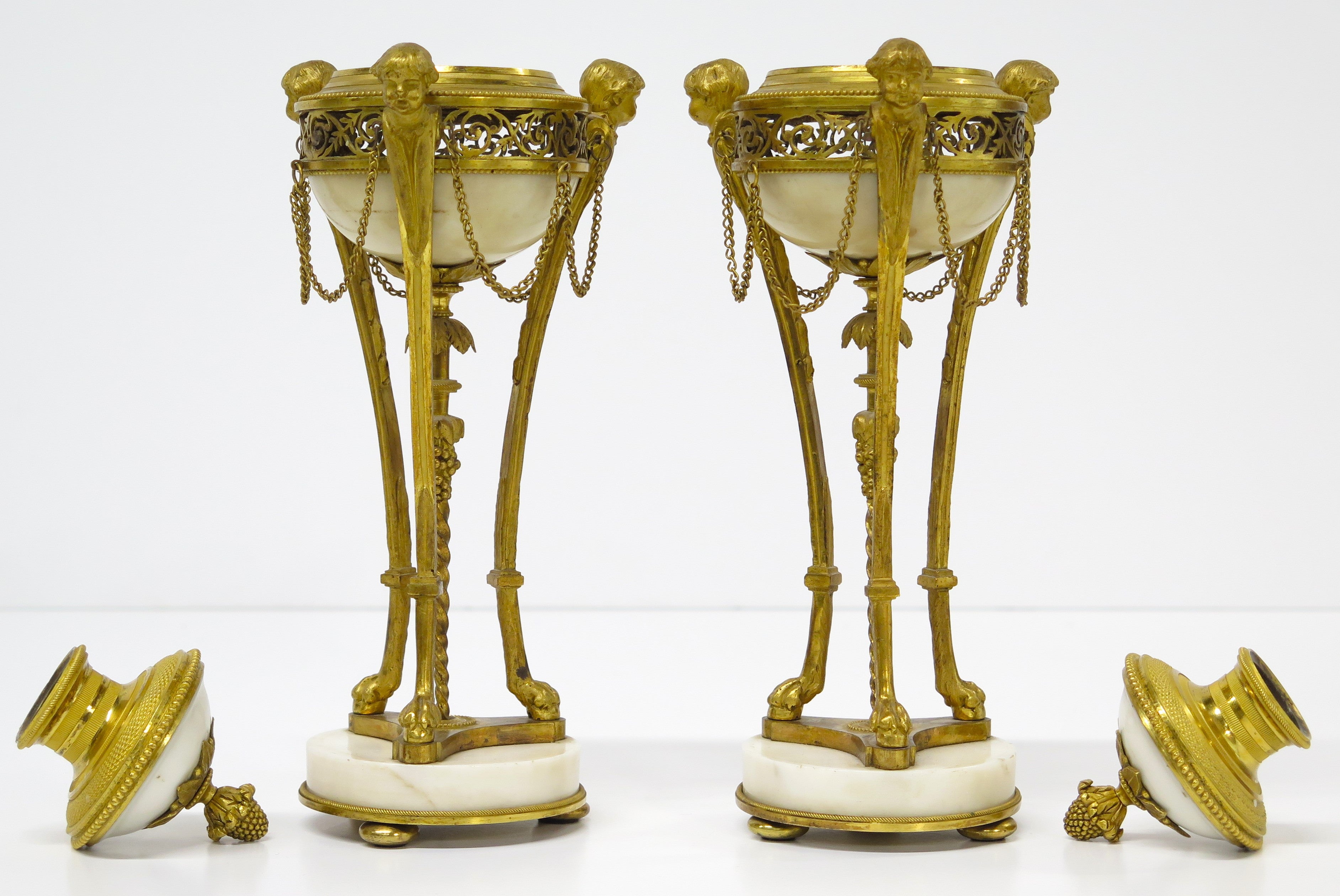 A Pair of Louis XVI Ormolu and White Marble Cassolettes