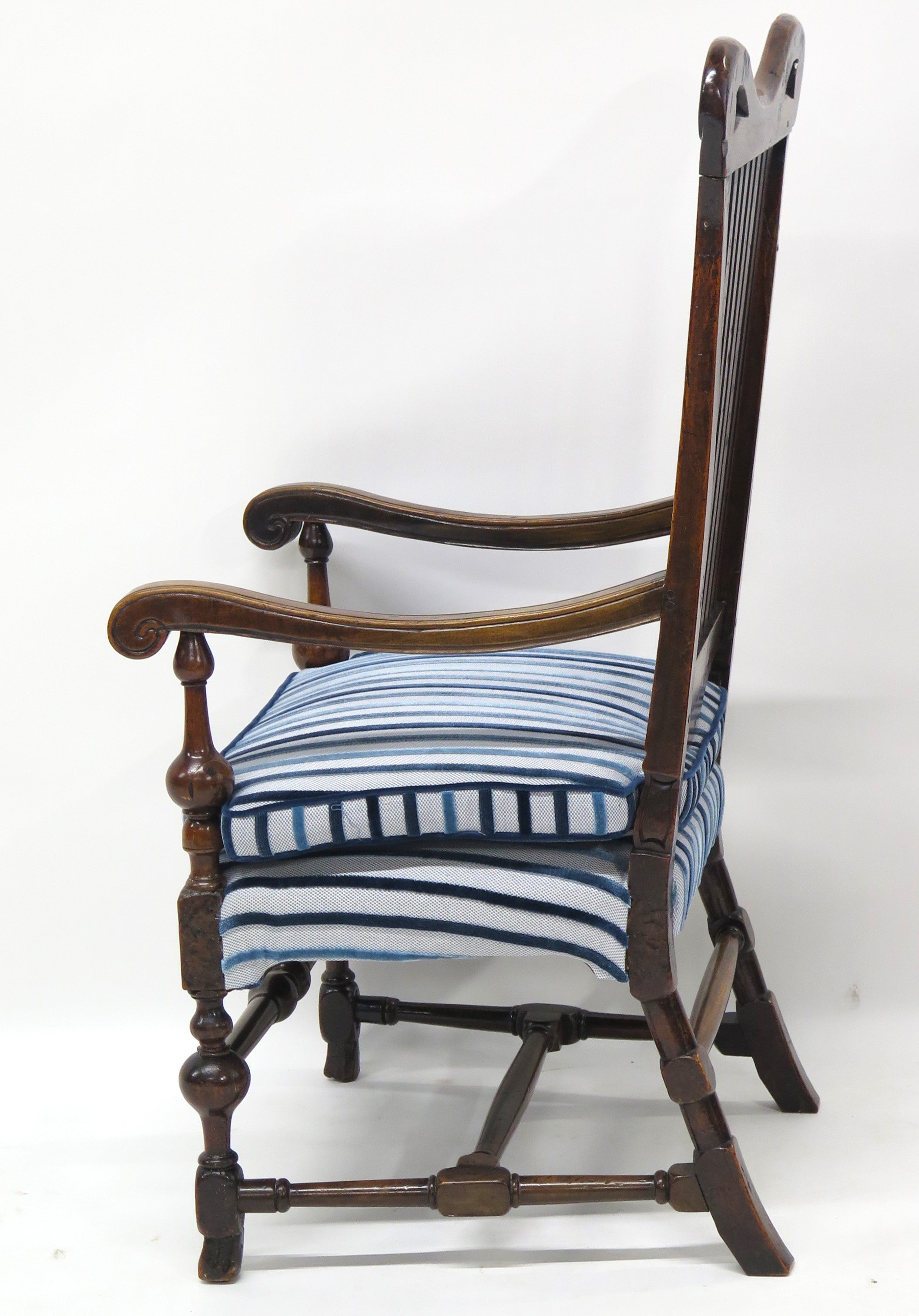 A Rare Form William and Mary Walnut Banister Back Armchair