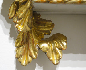 Pair of Carved Painted and Parcel Gilt Wall Brackets