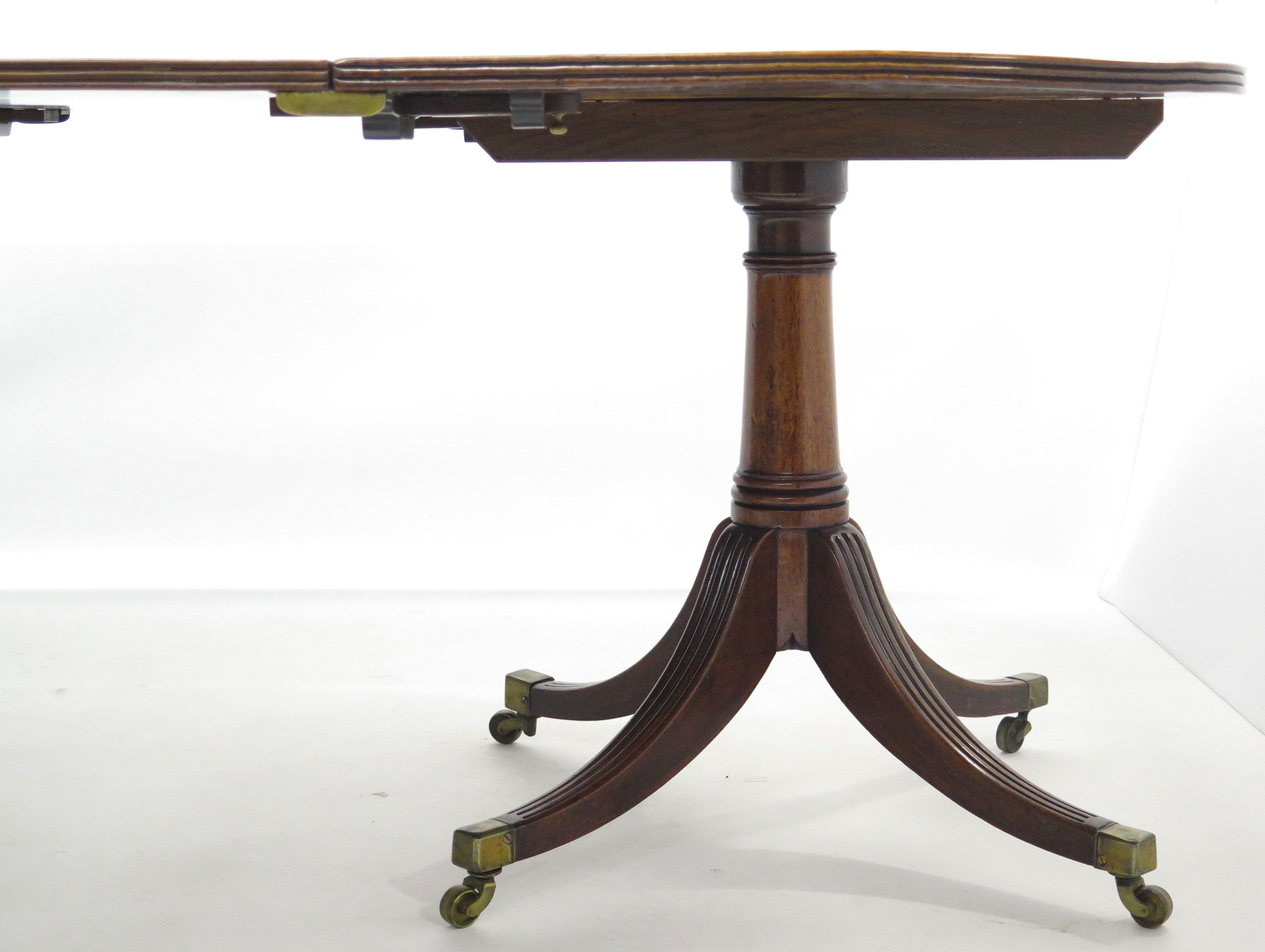 A Fine George III Three Pedestal Dining Table