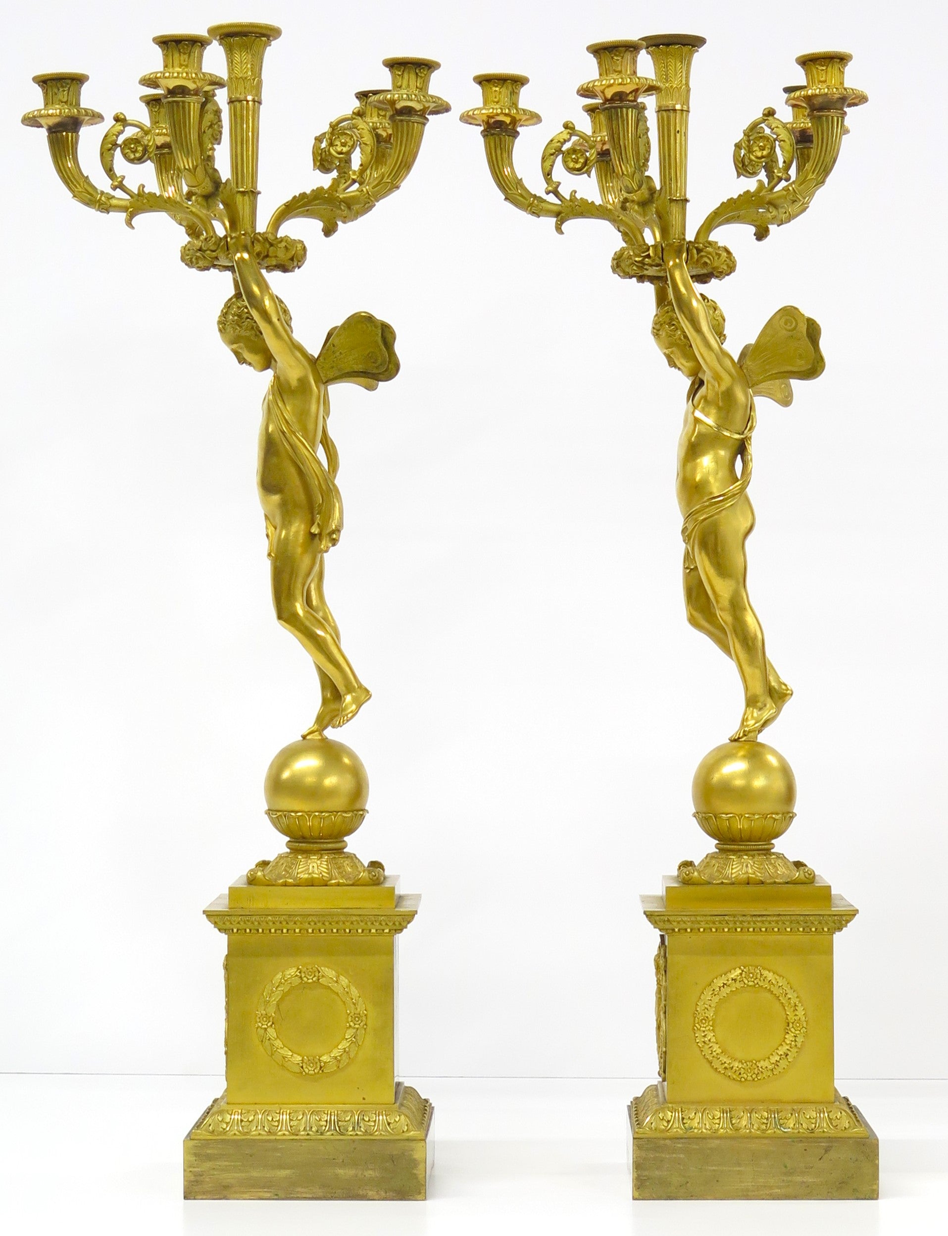 A Pair of French Empire Six Light Figural Candelabra