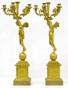 A Pair of French Empire Six Light Figural Candelabra