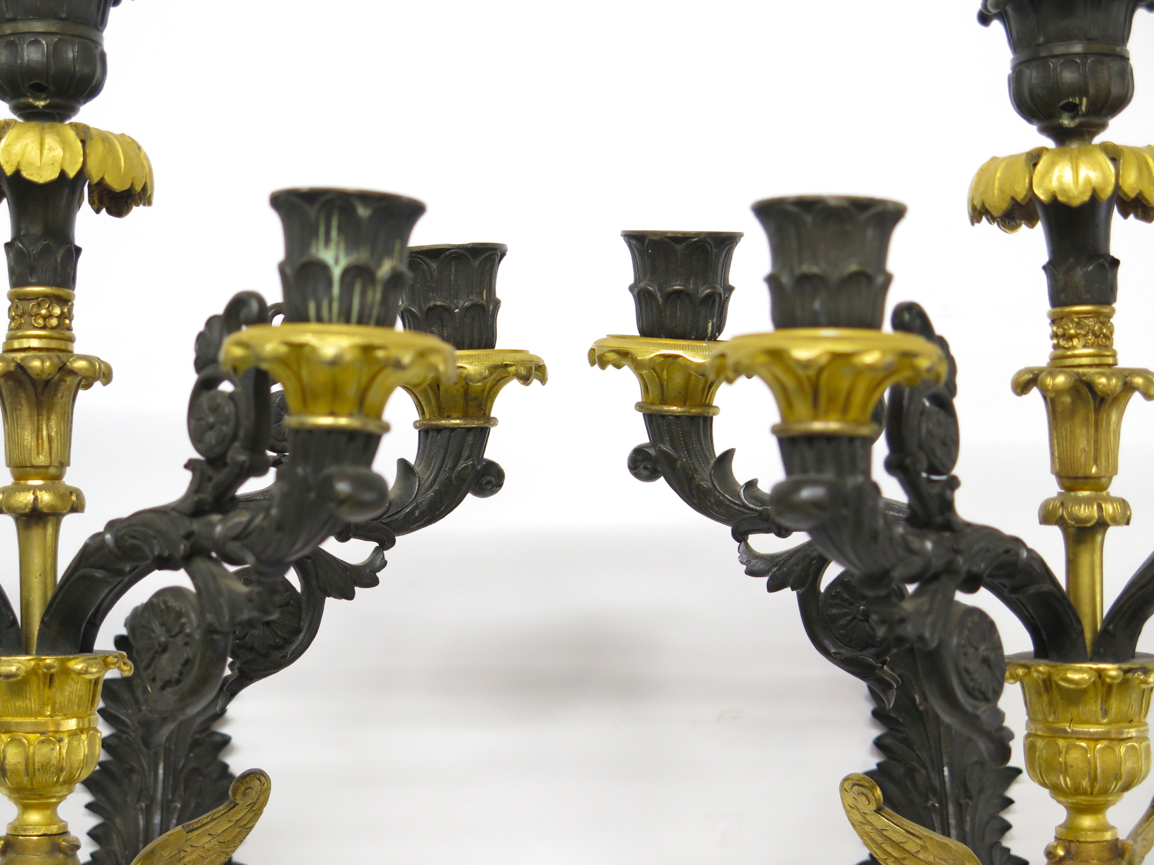 A Pair of Charles X Pattinated and Gilt Five Arm Wall Lights