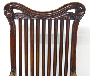 A Rare Form William and Mary Walnut Banister Back Armchair