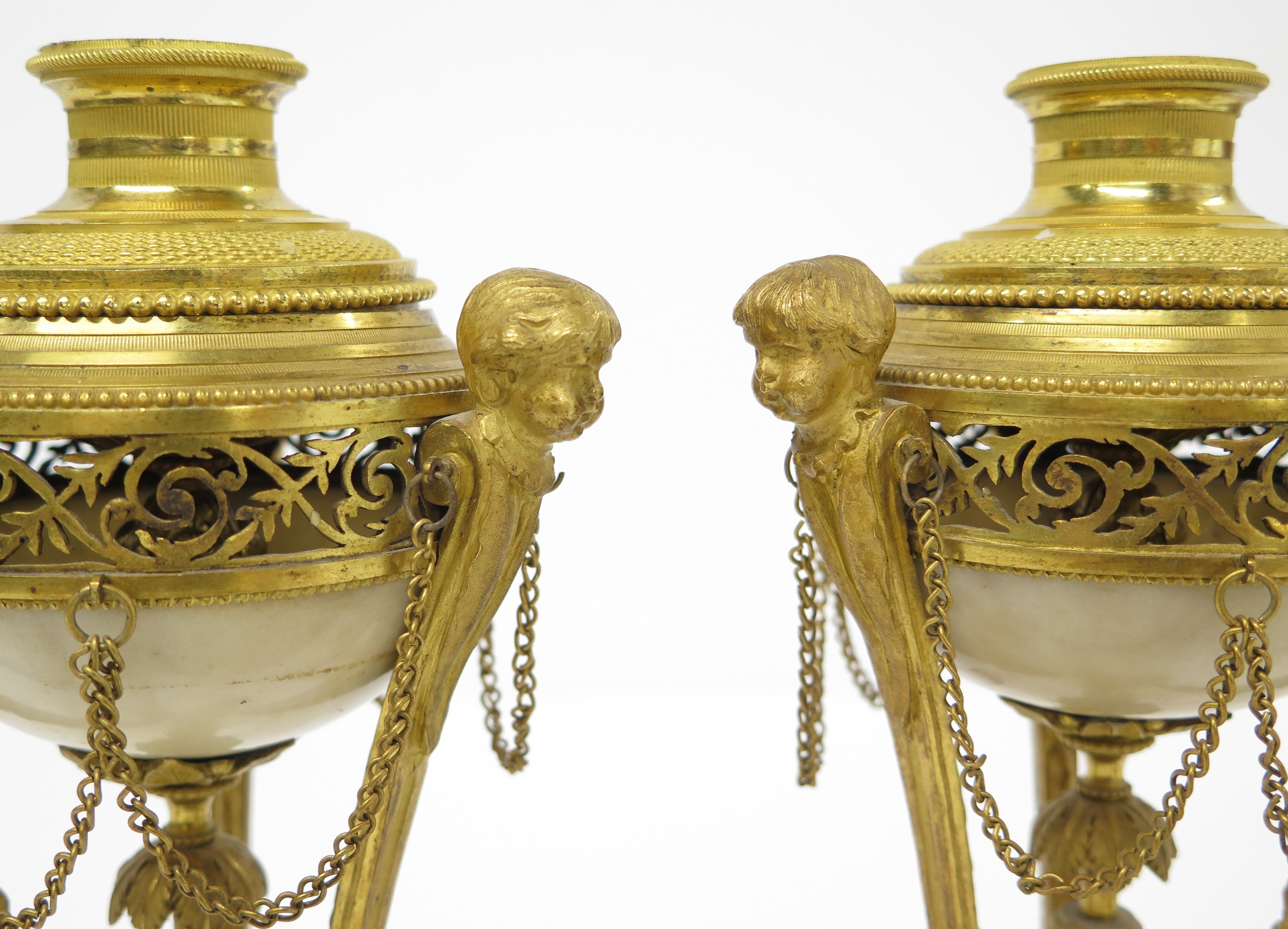 A Pair of Louis XVI Ormolu and White Marble Cassolettes