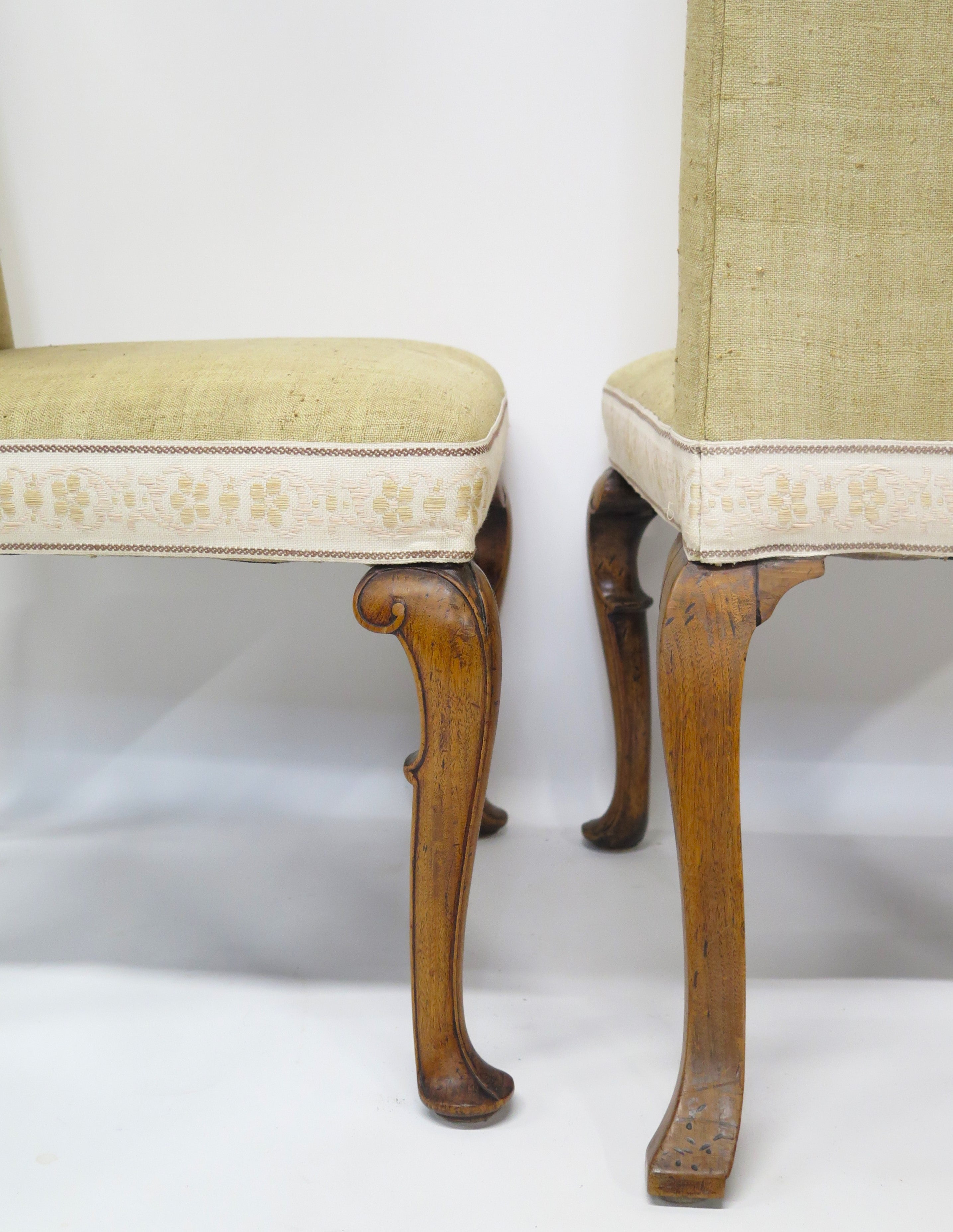 A Pair of Queen Anne Style Walnut Upholstered Backstools / Chairs