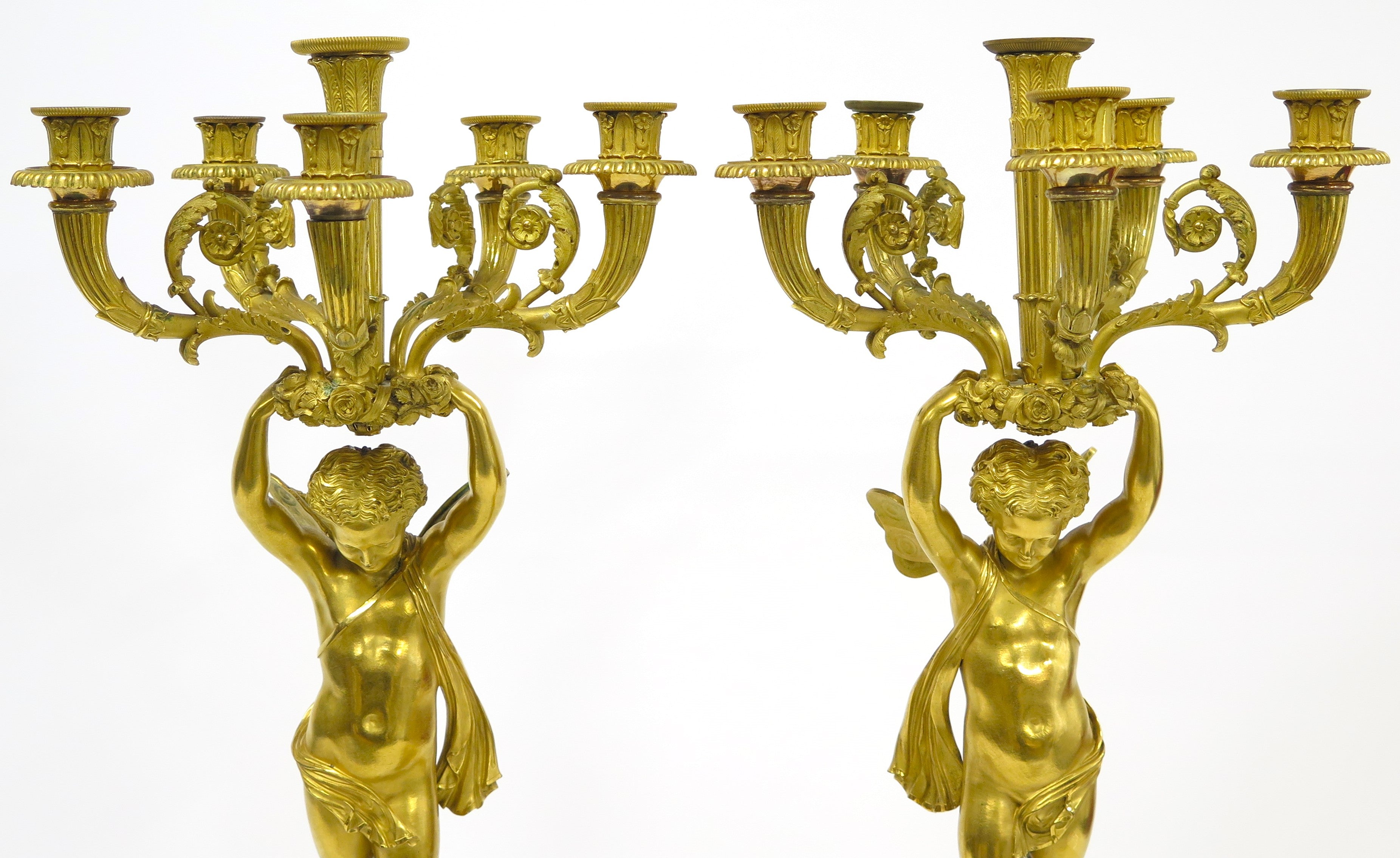 A Pair of French Empire Six Light Figural Candelabra