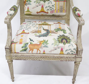 A Pair of Louis XVI Style Cream Colored Nicely Carved Fauteuils