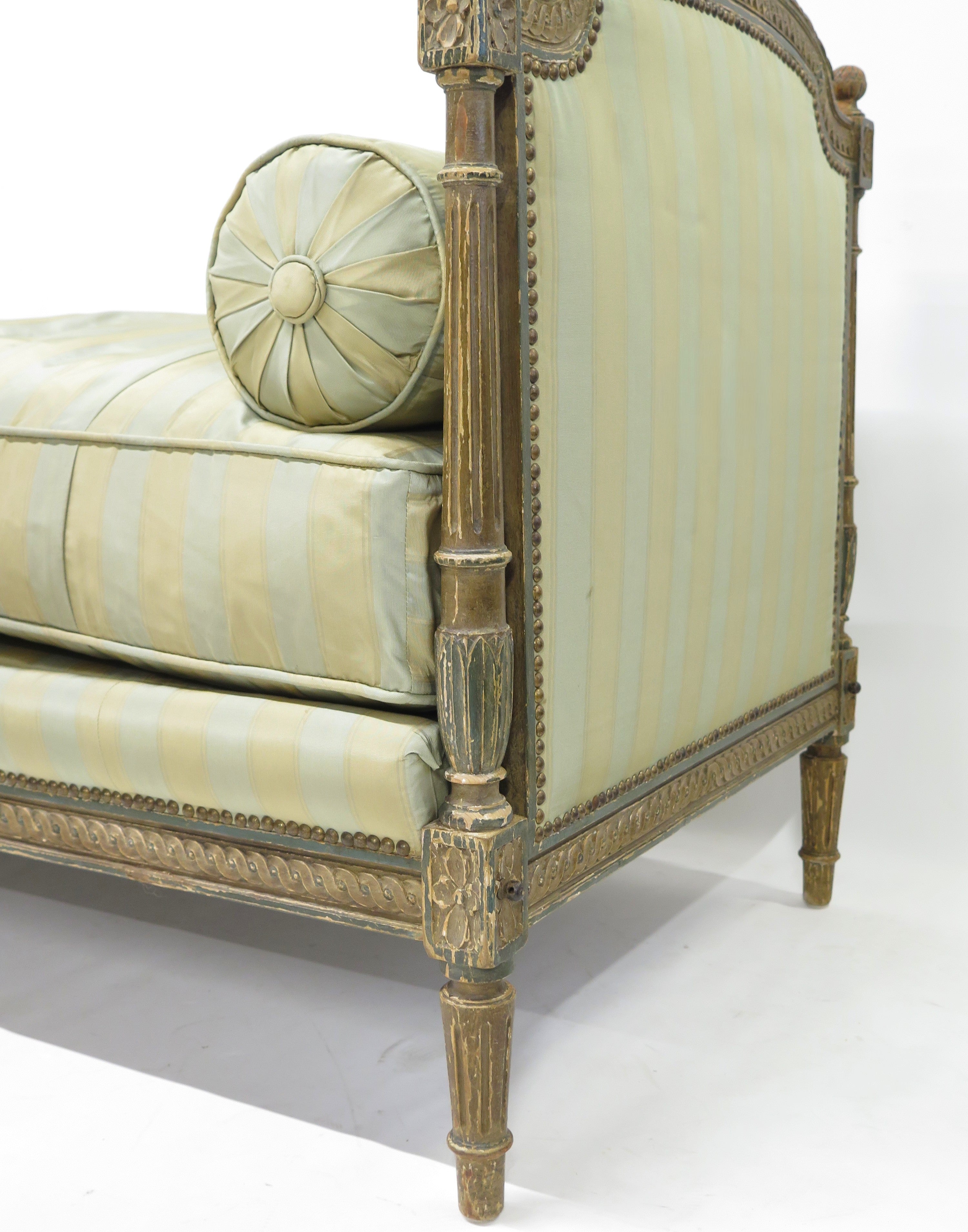 A Nicely Carved Louis XVI Paint and Parcel Gilt Daybed