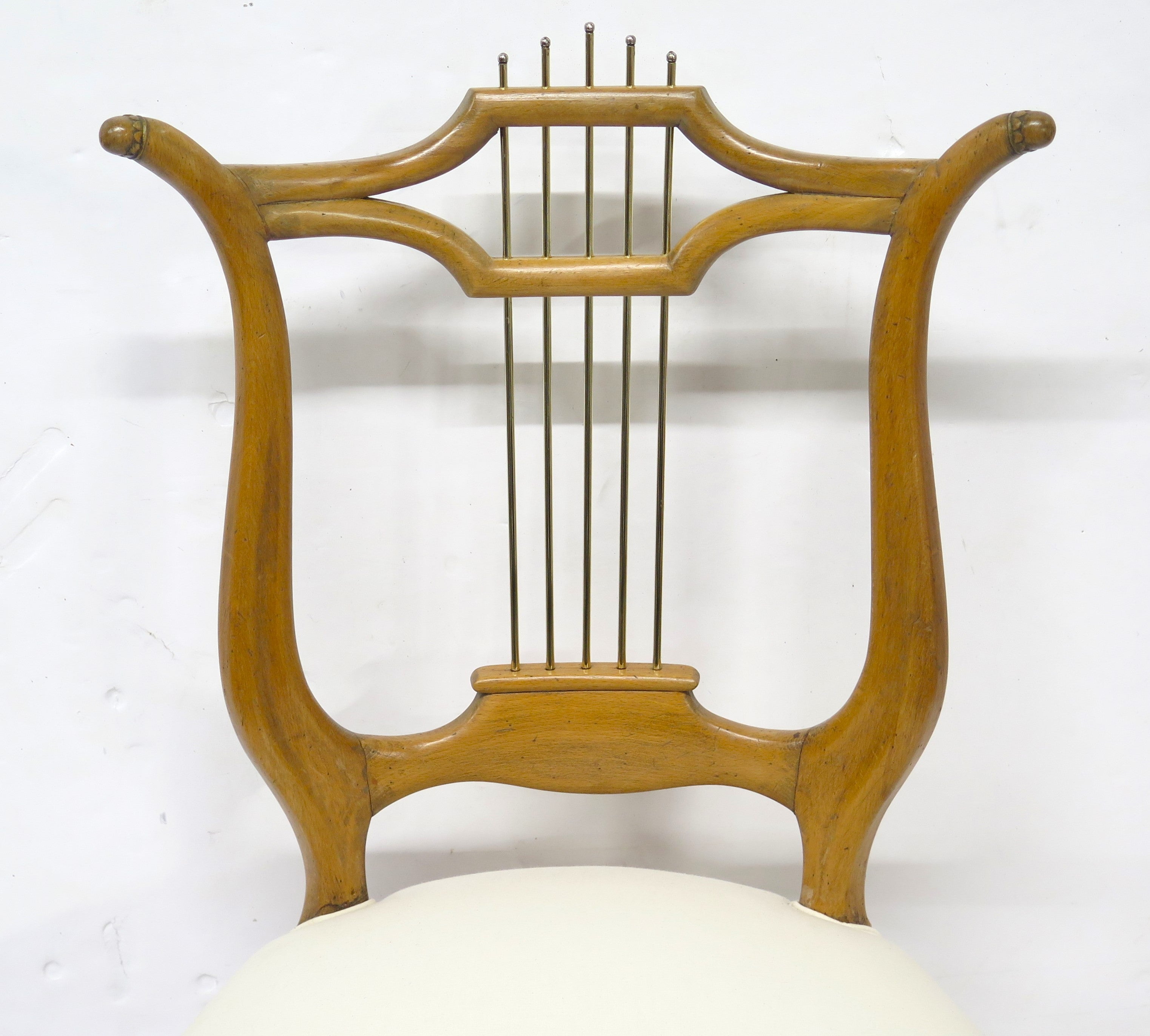 An Unusual Occasional Chair with Lyre Back